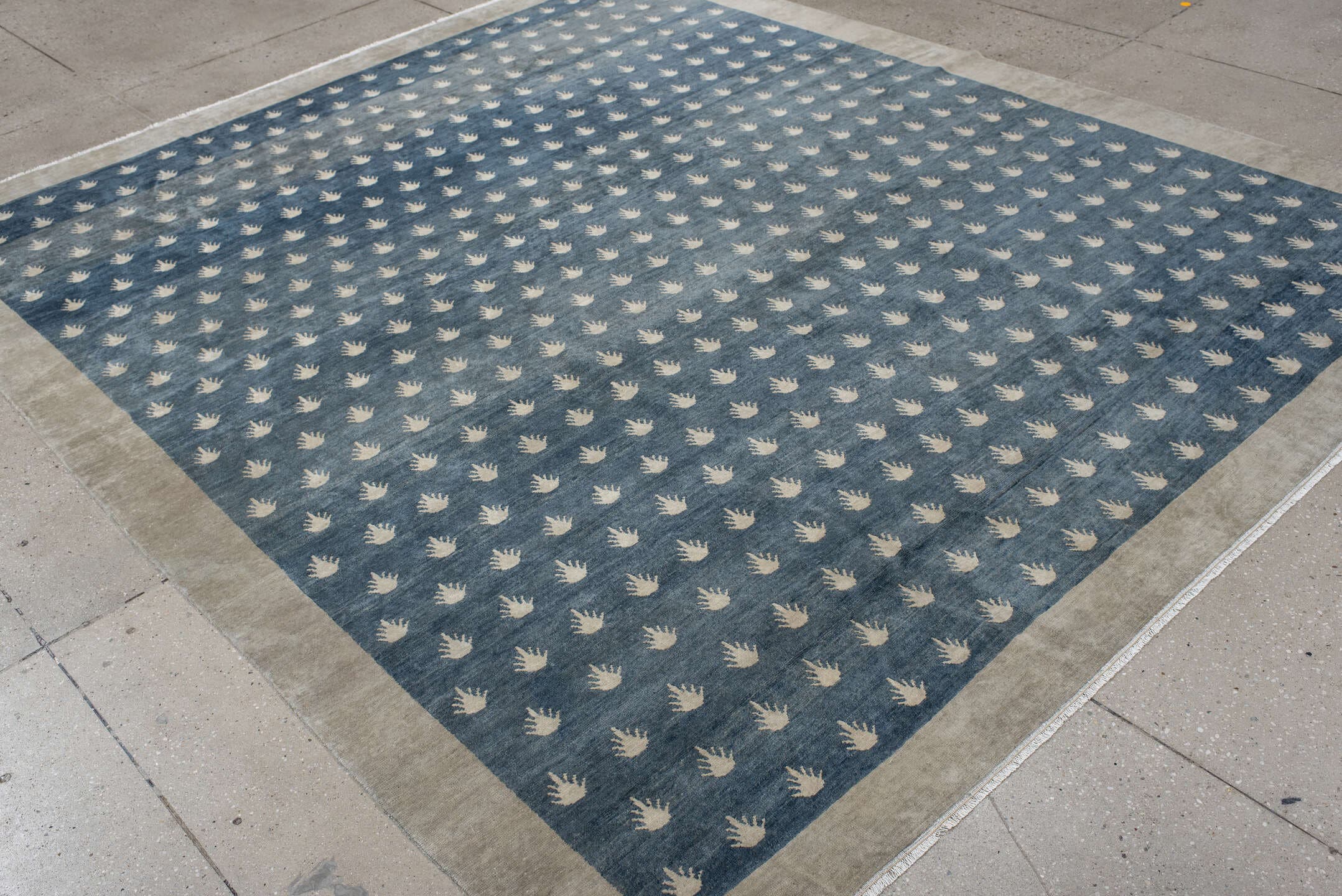 7' x 9' one-of-a-kind handmade vintage Tibetan rug. Color palette: blue, ivory, cream, taupe, gray, beige