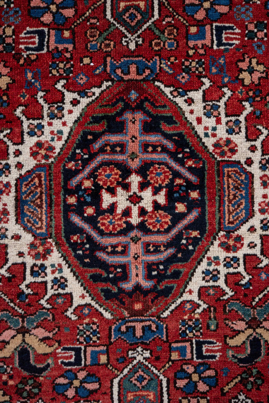 4' x 6' one-of-a-kind handmade vintage Karaje rug. Color palette: red, navy, ivory, sky blue, teal, rose, coral, charcoal