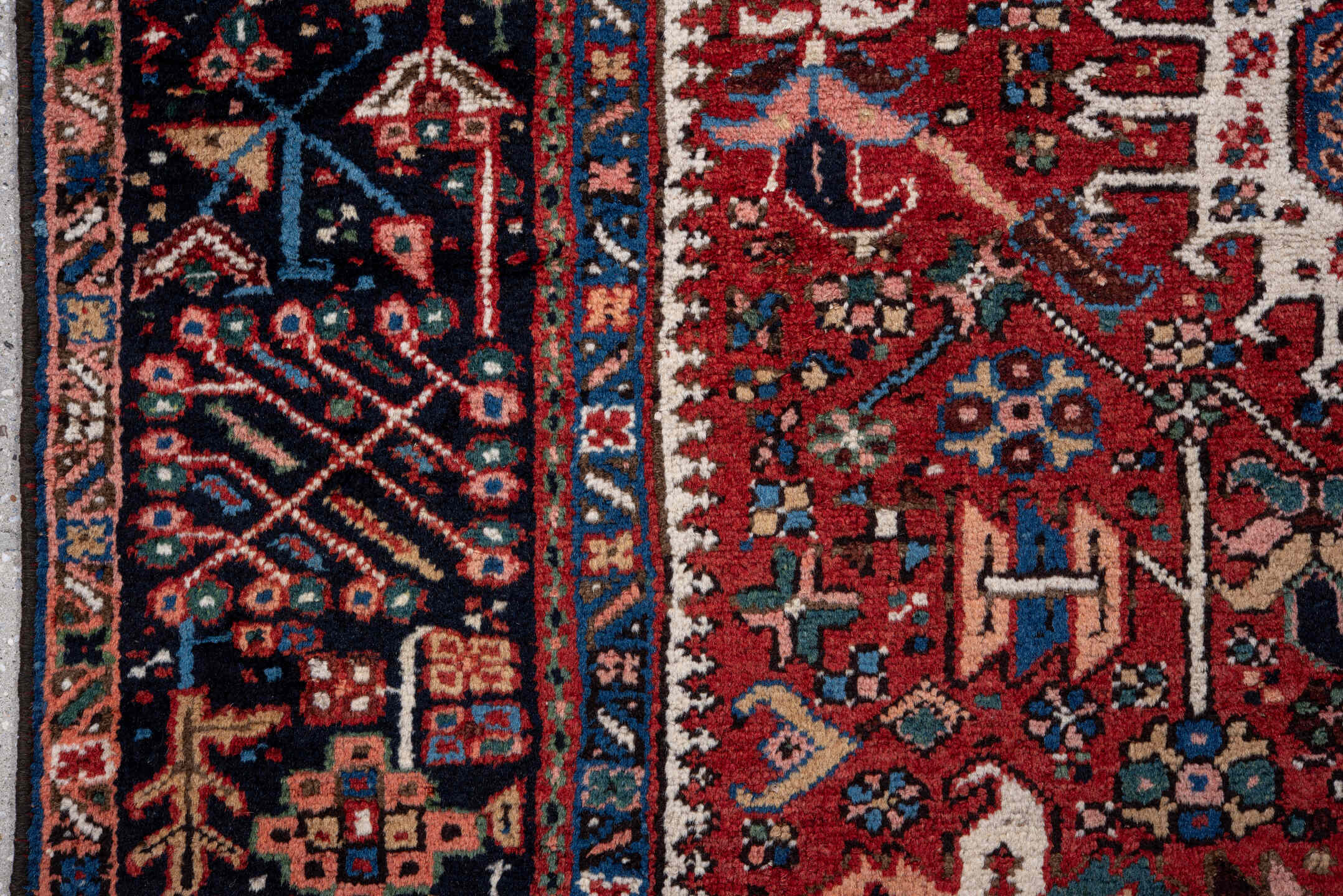 4' x 6' one-of-a-kind handmade vintage Karaje rug. Color palette: red, navy, ivory, sky blue, teal, rose, coral, charcoal