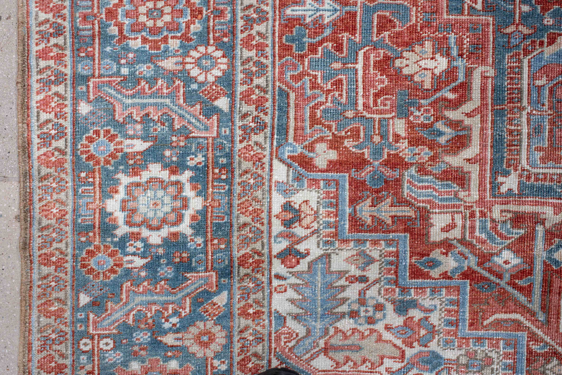 8' x 11' one-of-a-kind handmade antique Heriz large size rug. Color palette: ivory, sky blue, rust, terra cotta, brick
