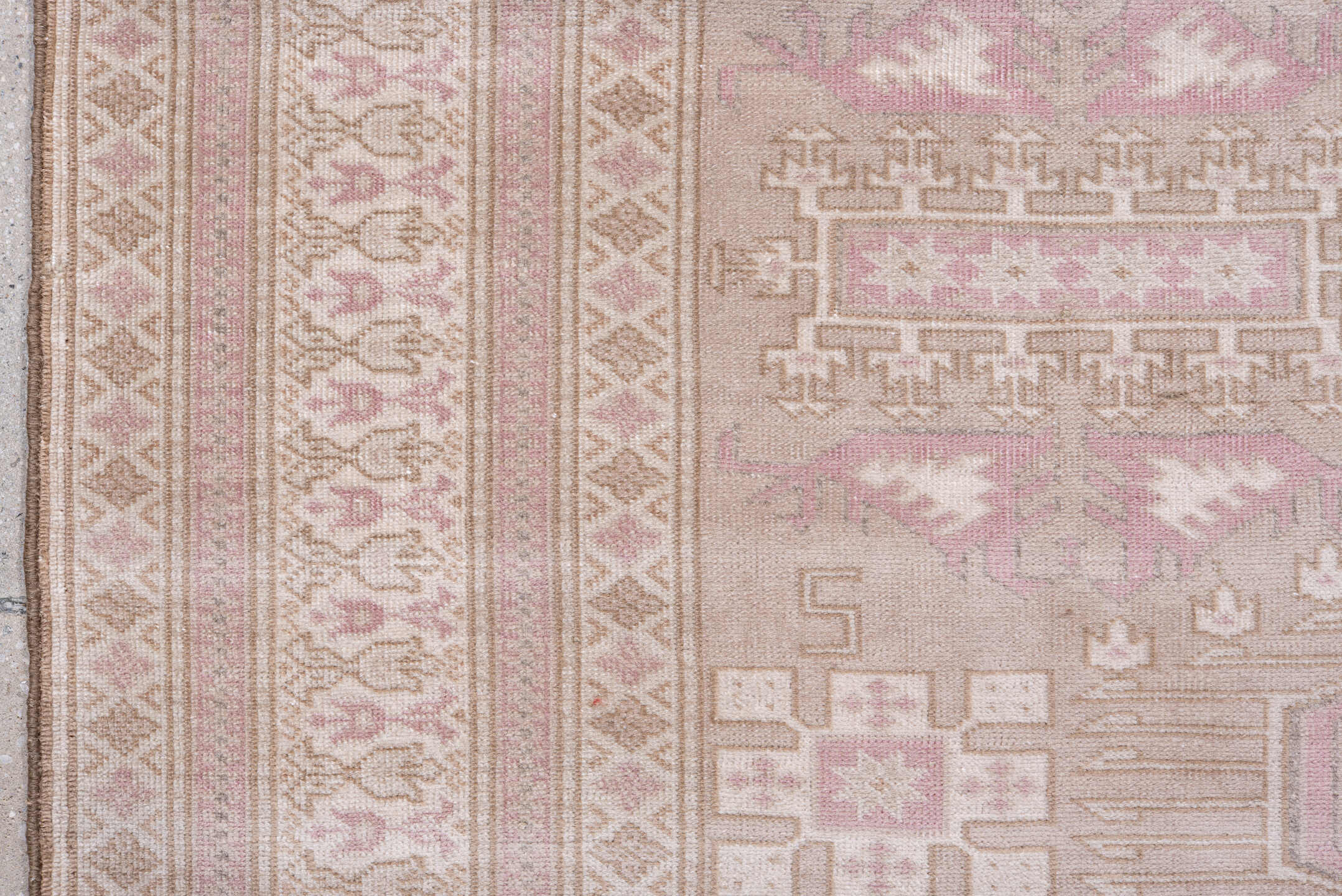 5' x 8' one-of-a-kind handmade vintage Sivas medium size rug. Color palette: gray, light gray, linen, off-white, pink