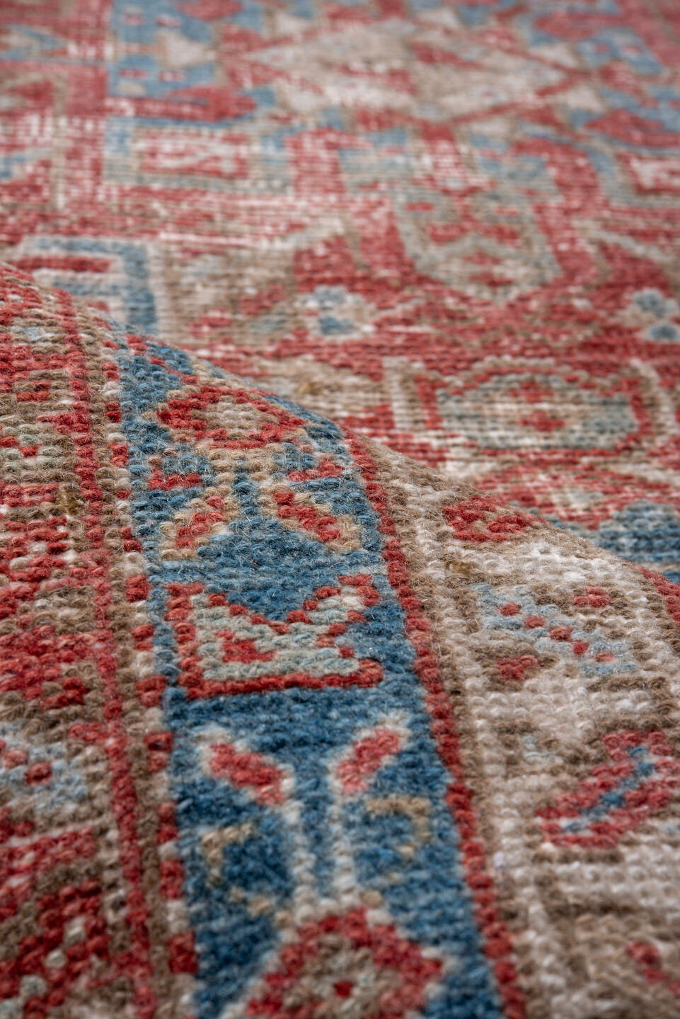 2' x 8' one-of-a-kind handmade vintage Karaje runner rug. Color palette: rust, ivory, sky blue, brick, coral, slate blue