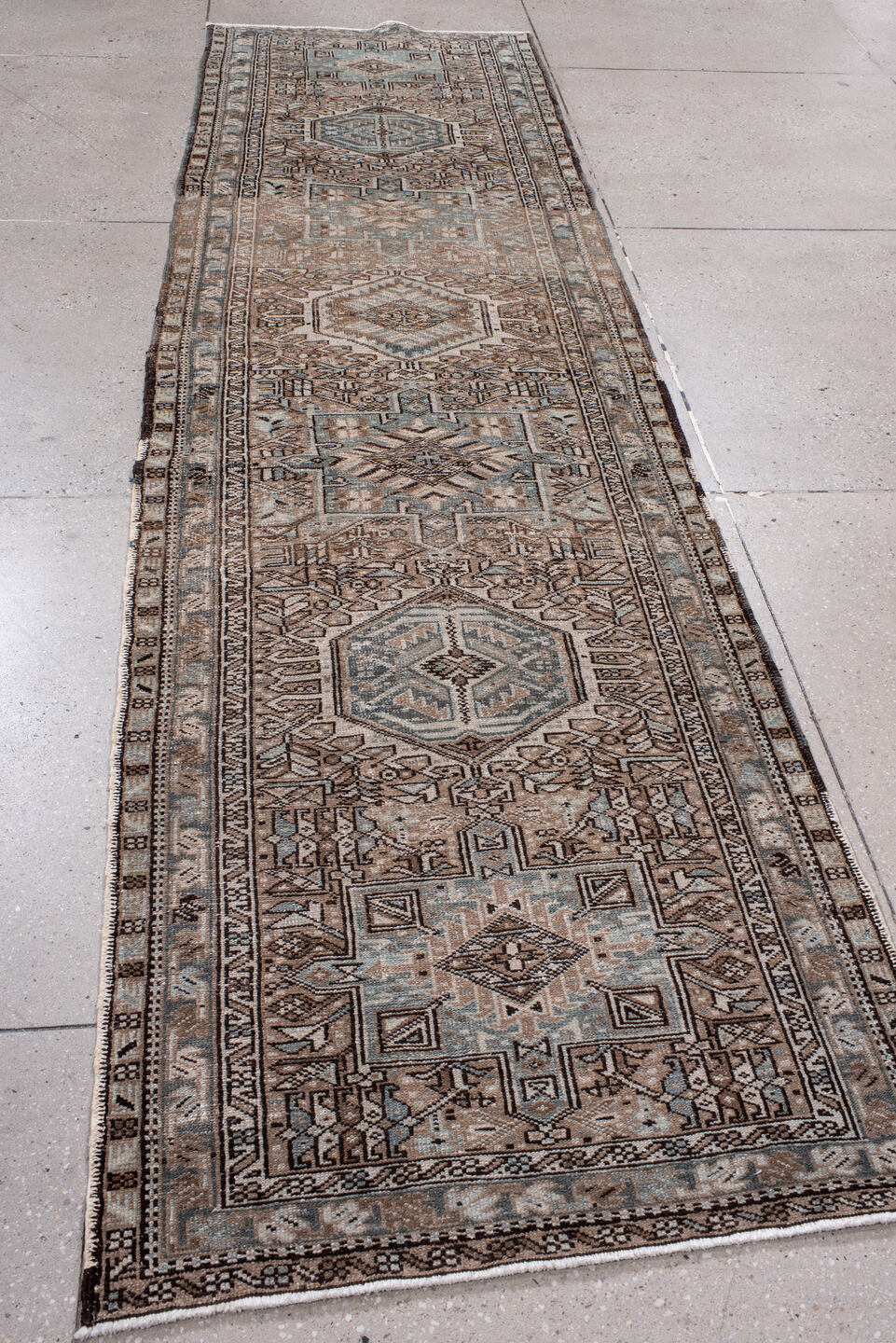 3' x 11' one-of-a-kind handmade antique Karaje runner rug. Color palette: taupe, brown, ivory, slate, camel, charcoal