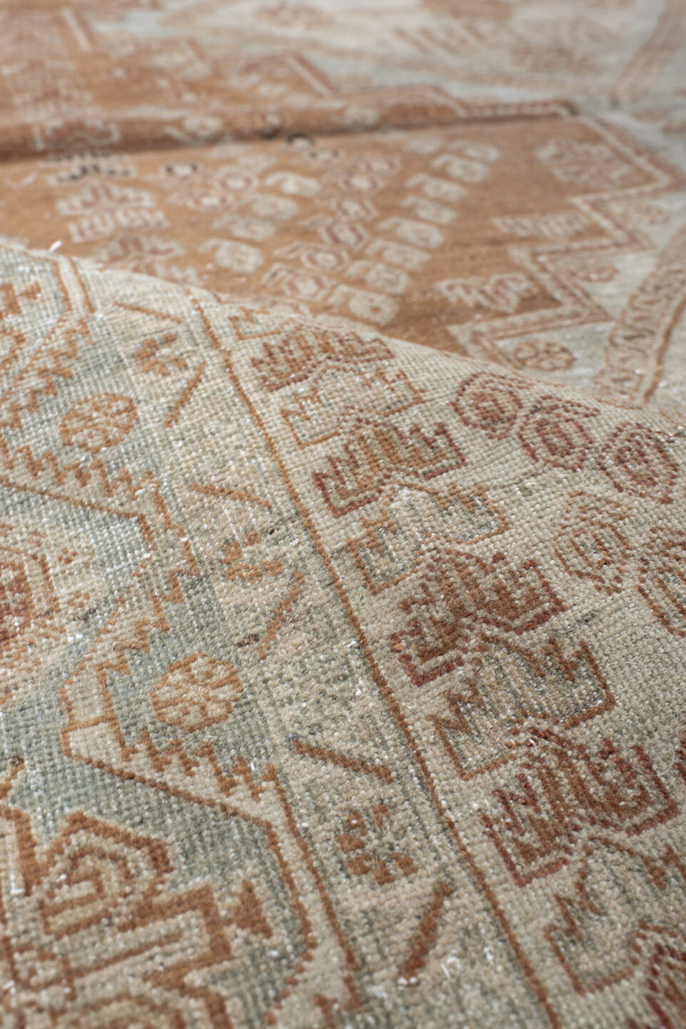 4' x 6' one-of-a-kind handmade vintage Afshar rug. Color palette: ivory, terra cotta, pale blue, taupe, camel, rust