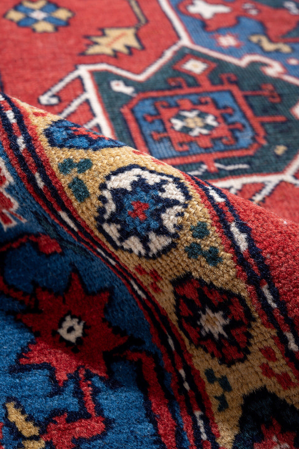 3' x 5' one-of-a-kind handmade vintage Caucasian small size rug. Color palette: red, blue, ivory, navy, teal, gold, crimson