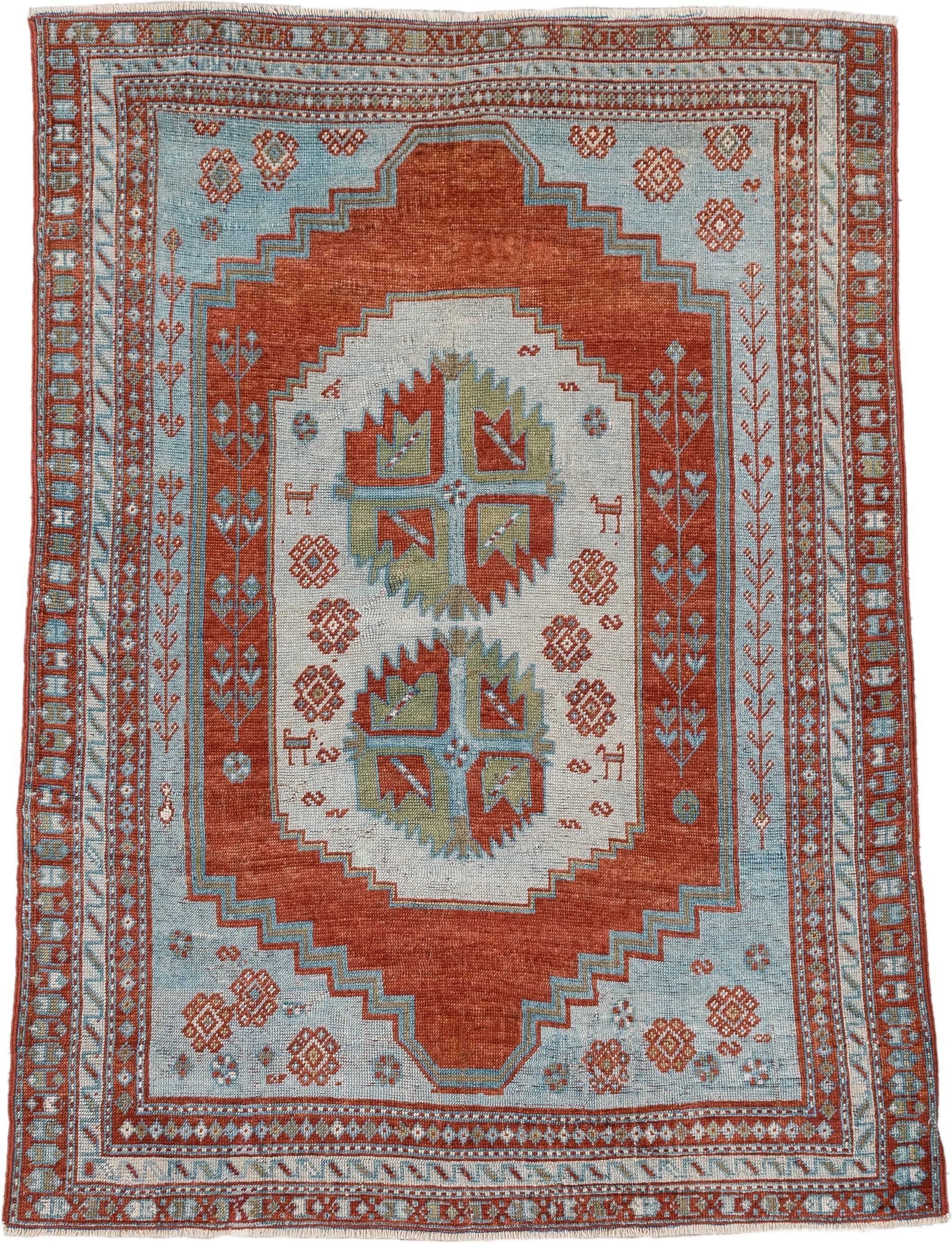 4' x 3' one-of-a-kind handmade antique Caucasian rug. Color palette: terracotta, sky blue, ivory, sage, rust, brown
