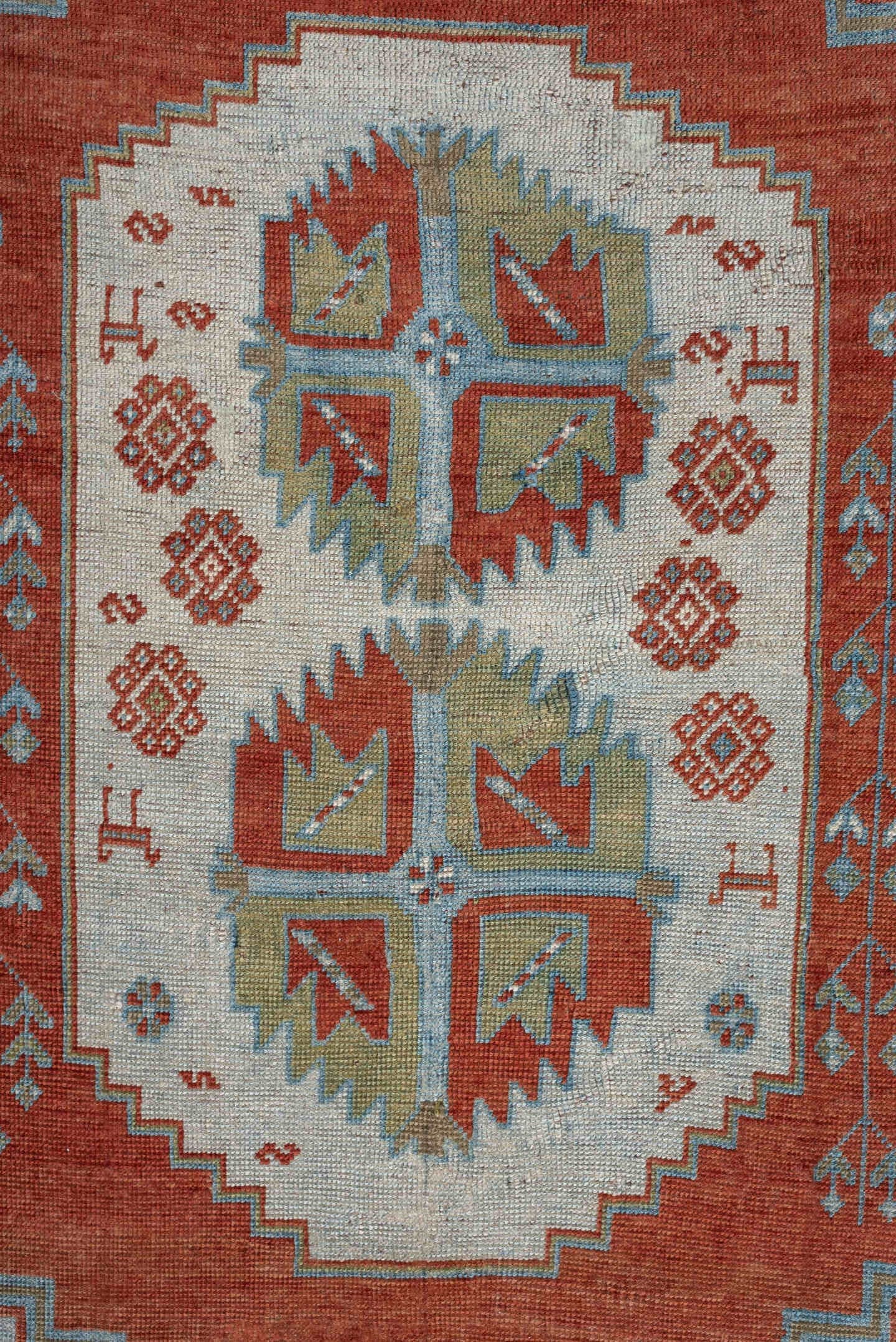 4' x 3' one-of-a-kind handmade antique Caucasian rug. Color palette: terracotta, sky blue, ivory, sage, rust, brown