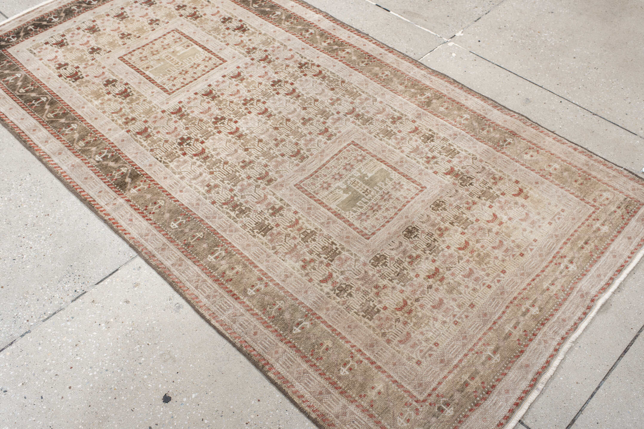 3' x 6' one-of-a-kind handmade vintage Belouch small size rug. Color palette: ivory, taupe, brown, rust, camel, beige, gray