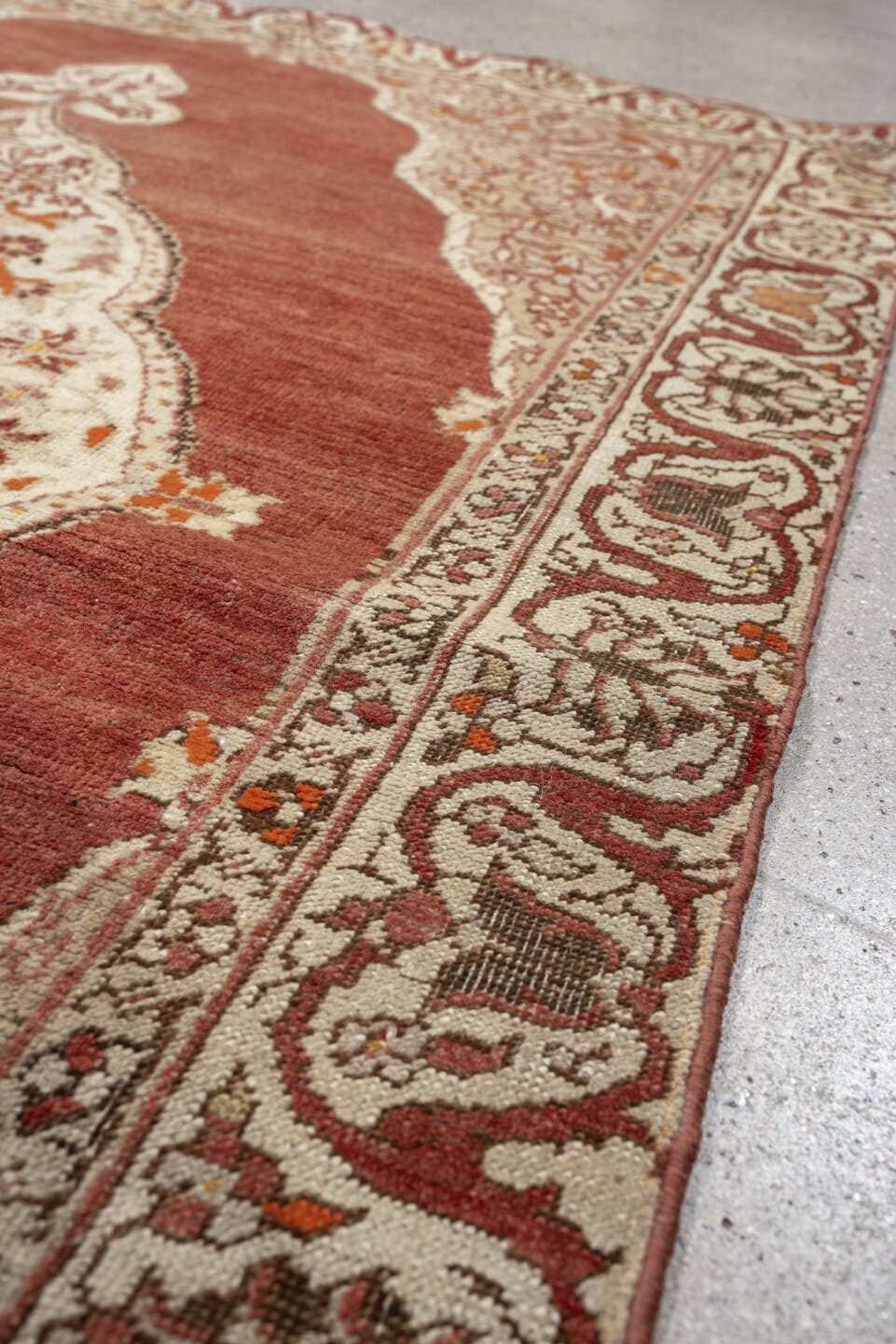 6' x 4' one-of-a-kind handmade antique Anatolian rug. Color palette: terracotta, ivory, rust, taupe, coral, camel, brown