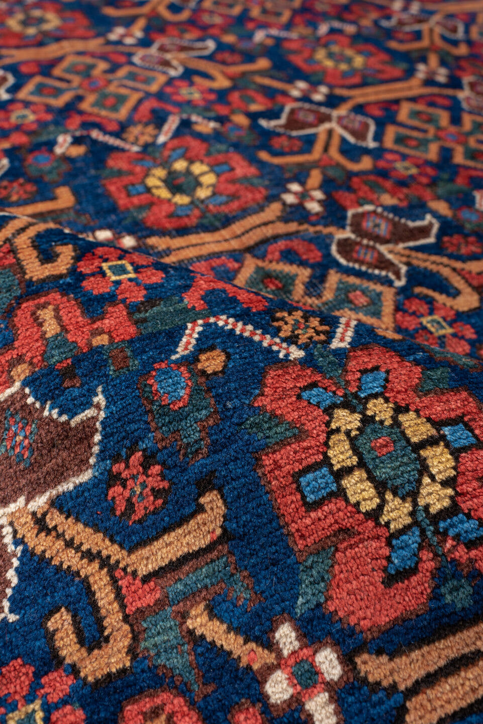 4' x 6' one-of-a-kind handmade antique Afshar small size rug. Color palette: indigo, rust, ivory, navy, camel, sage