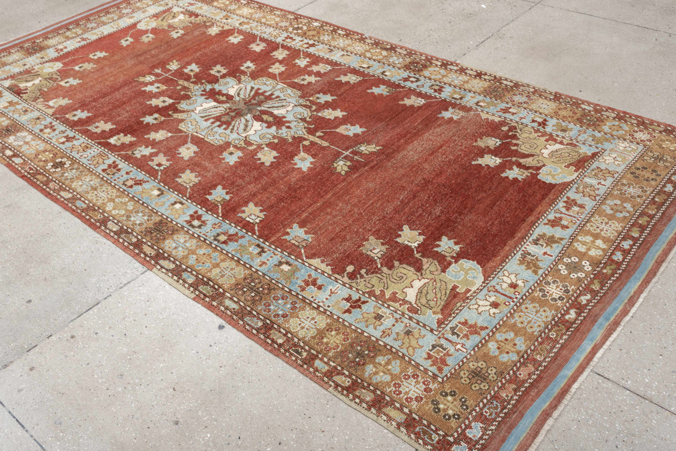 5' x 10' one-of-a-kind handmade vintage Anatolian medium size rug. Color palette: terracotta, sky blue, ivory, camel, taupe