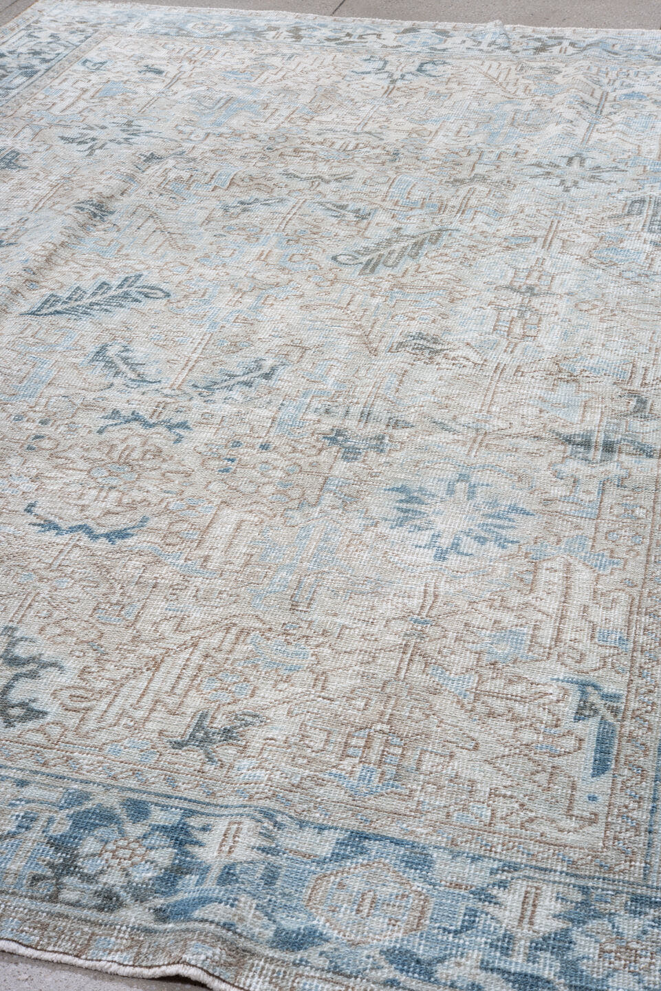 7' x 11' one-of-a-kind handmade vintage Heriz large size rug. Color palette: ivory, pale blue, taupe, slate, cream