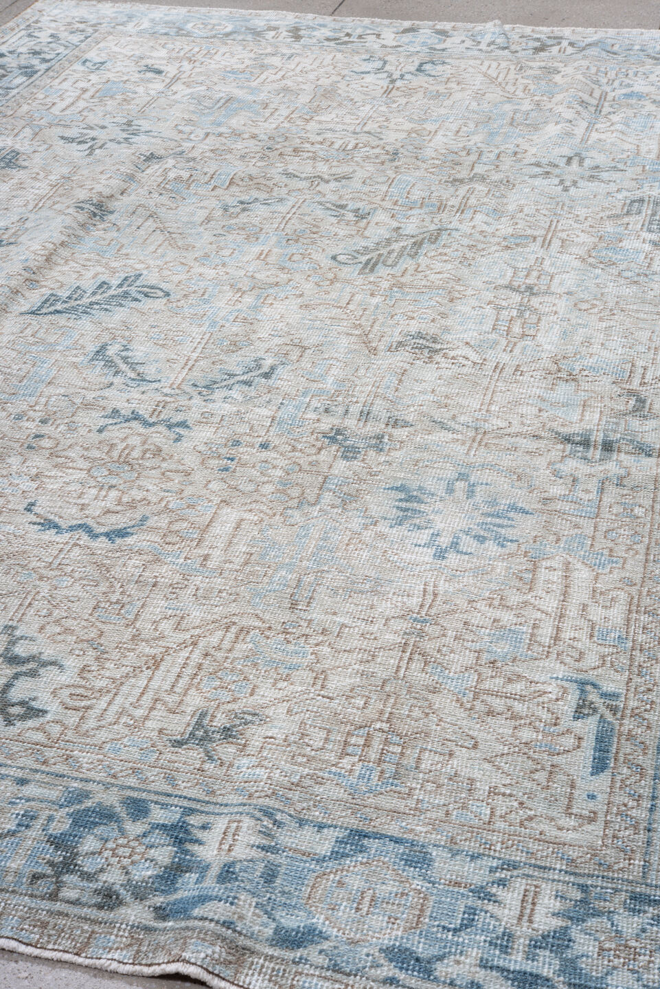 7' x 11' one-of-a-kind handmade vintage Heriz large size rug. Color palette: ivory, pale blue, taupe, slate, cream