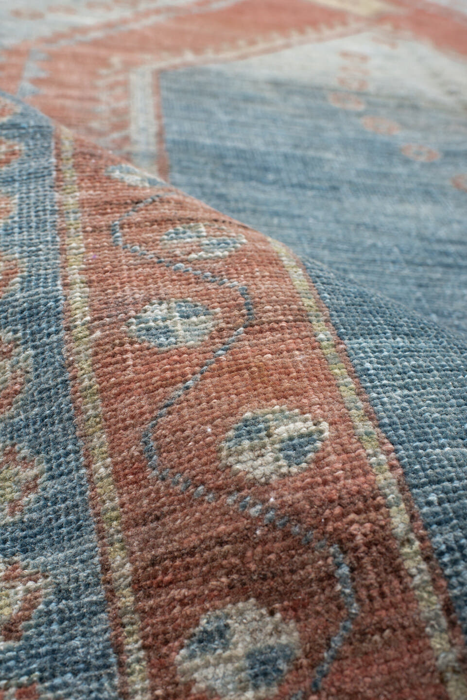 5' x 6' one-of-a-kind handmade antique Gabbe rug. Color palette: blue, terra cotta, ivory, sage, slate, terracotta, brown