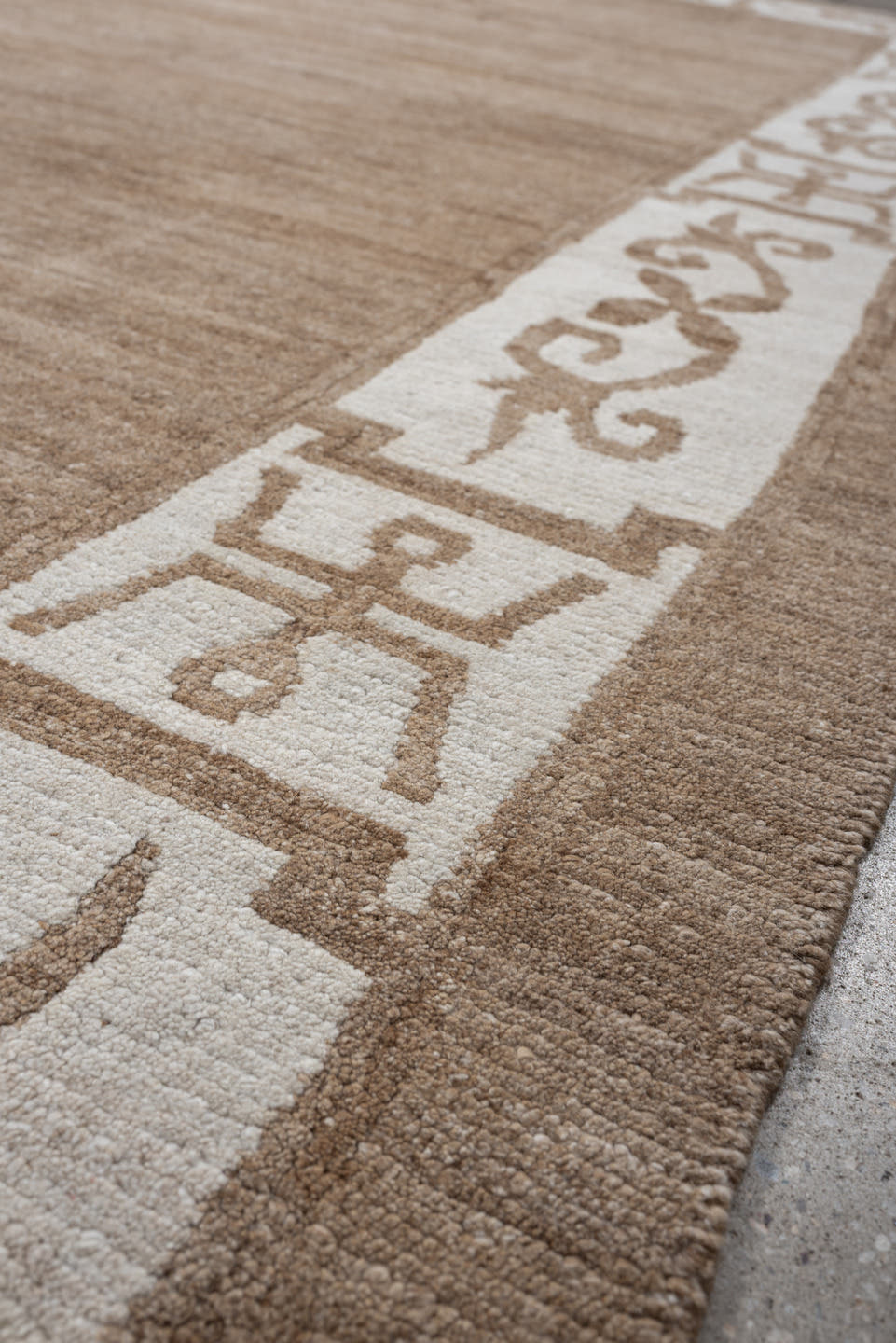 8' x 10' one-of-a-kind handmade vintage Tibetan large size rug. Color palette: camel, ivory, taupe, beige, gray