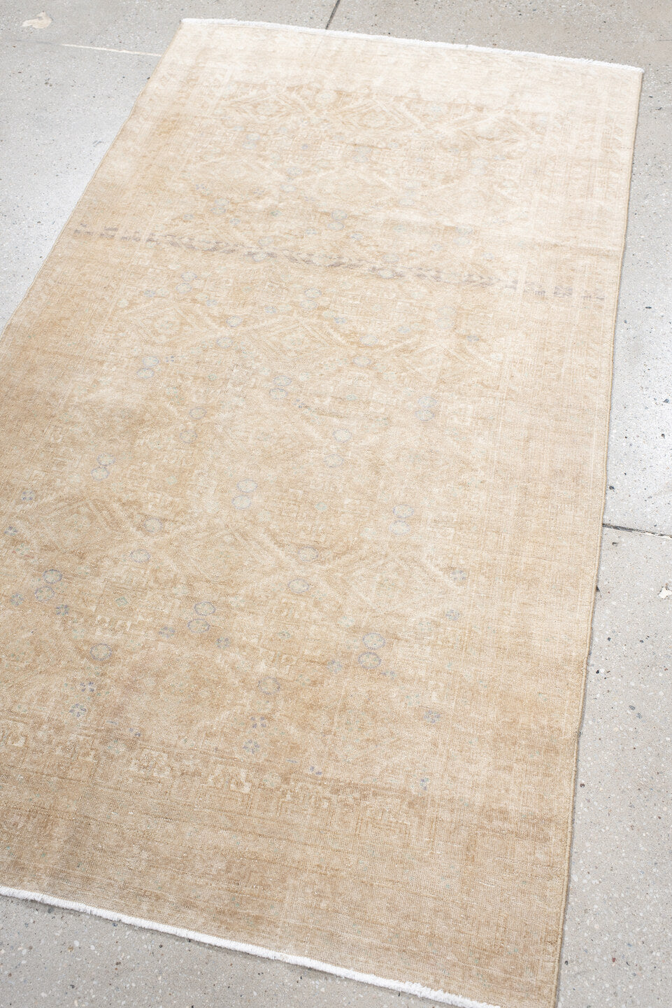 3' x 5' one-of-a-kind handmade antique Belouch small size rug. Color palette: ivory, sand, beige, pale blue, taupe, camel