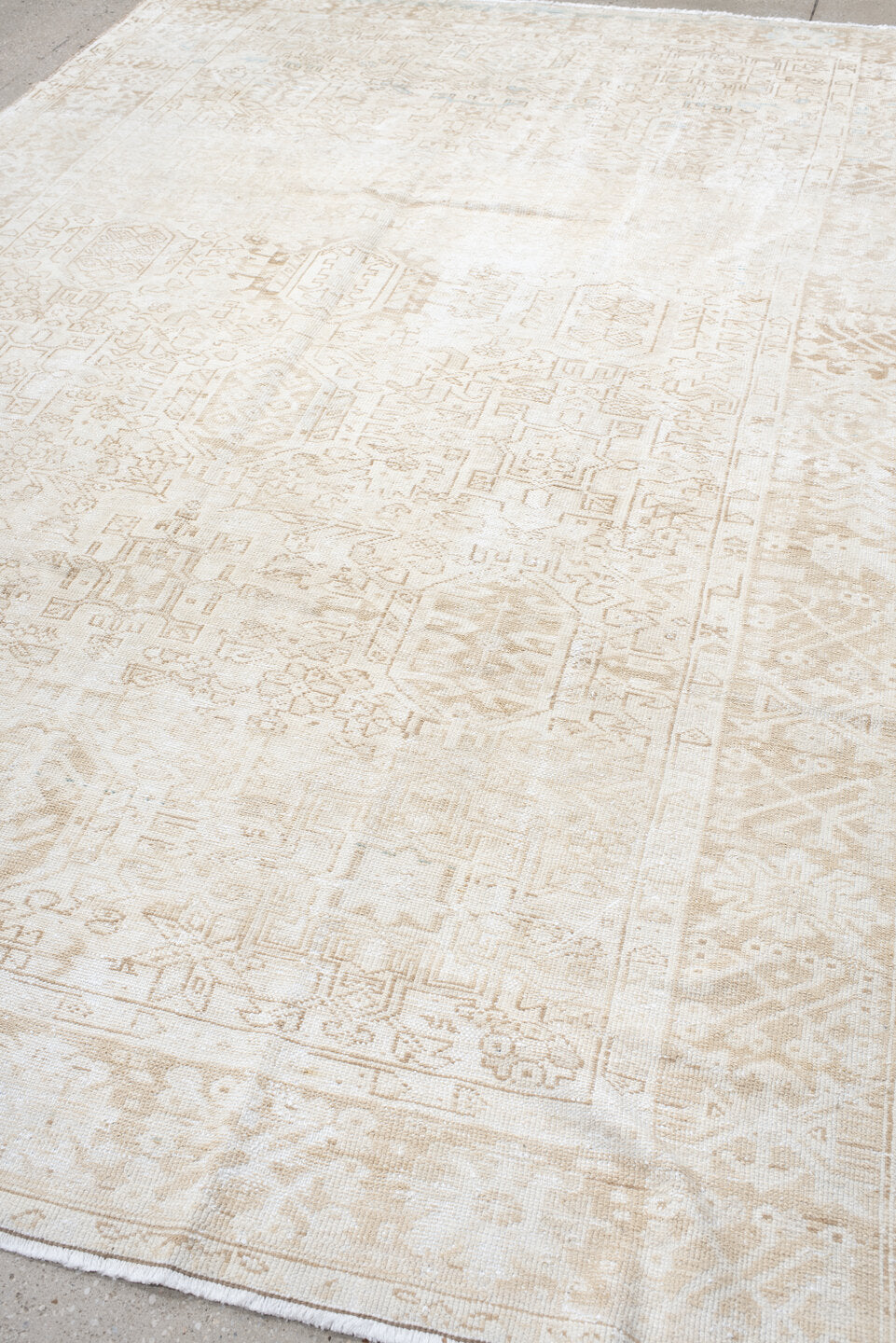 7' x 10' one-of-a-kind handmade antique Heriz large size rug. Color palette: ivory, cream, beige, sand, pale blue, taupe