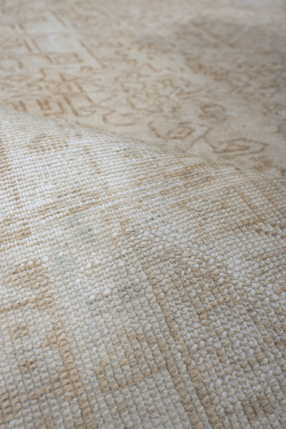 7' x 10' one-of-a-kind handmade antique Heriz large size rug. Color palette: ivory, cream, beige, sand, pale blue, taupe