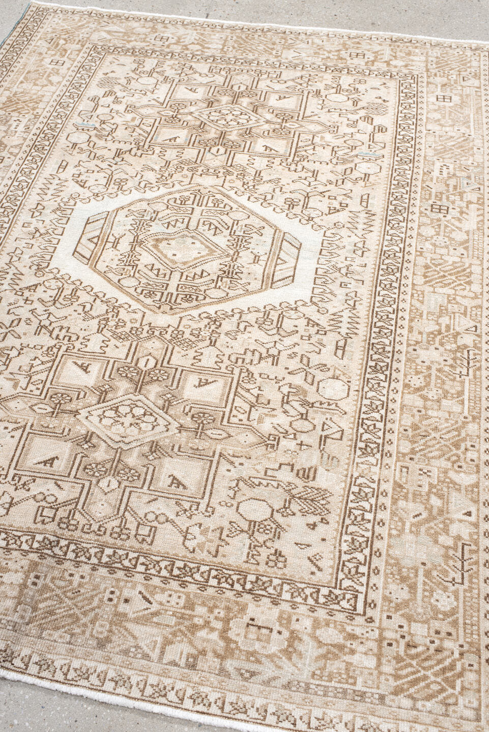 5' x 6' one-of-a-kind handmade antique Karaje rug. Color palette: ivory, taupe, beige, camel, sand, light brown, gray, brown