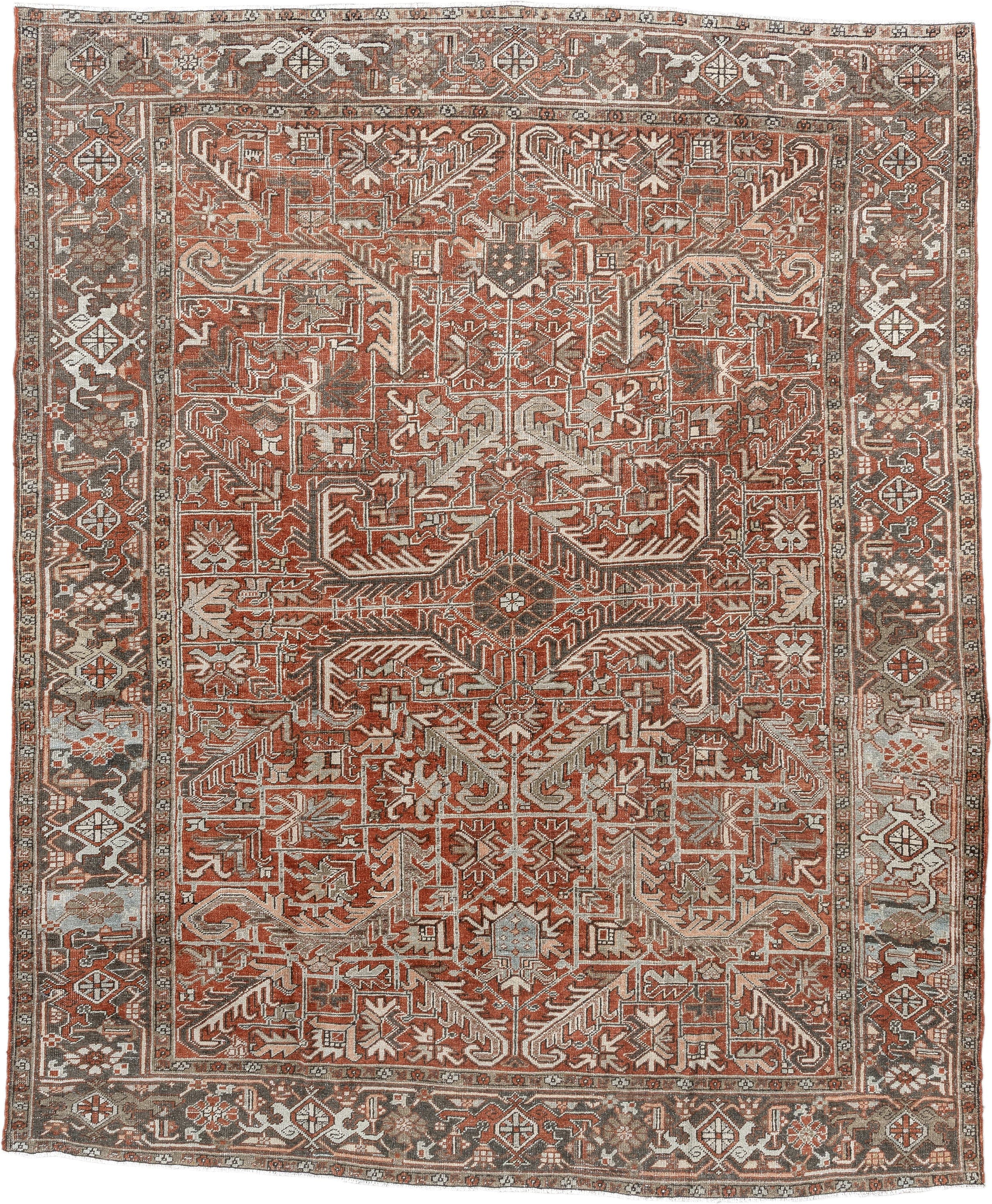 8' x 9' one-of-a-kind handmade antique Heriz rug. Color palette: terra cotta, ivory, taupe, brown, charcoal, rust