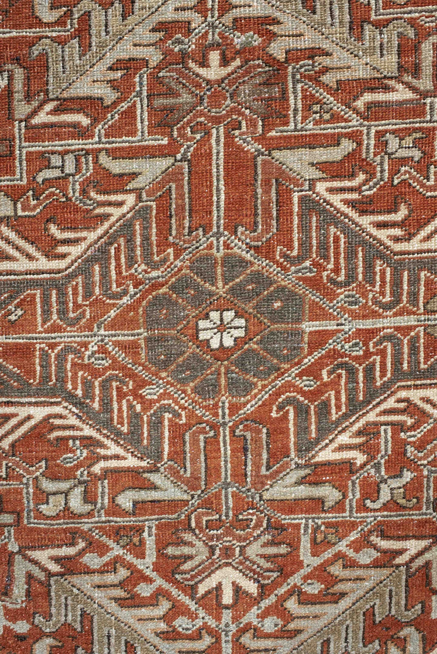 8' x 9' one-of-a-kind handmade antique Heriz rug. Color palette: terra cotta, ivory, taupe, brown, charcoal, rust