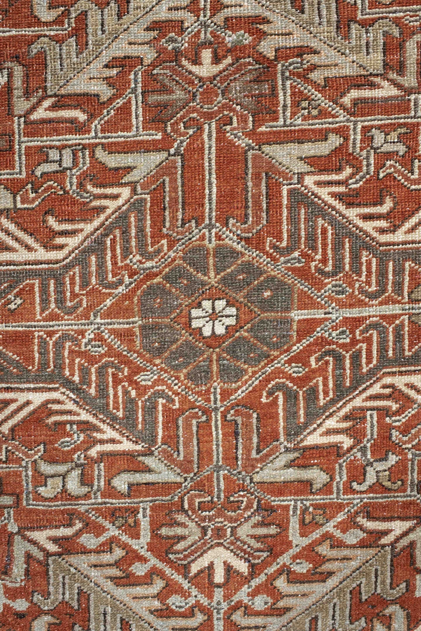 8' x 9' one-of-a-kind handmade antique Heriz rug. Color palette: terra cotta, ivory, taupe, brown, charcoal, rust