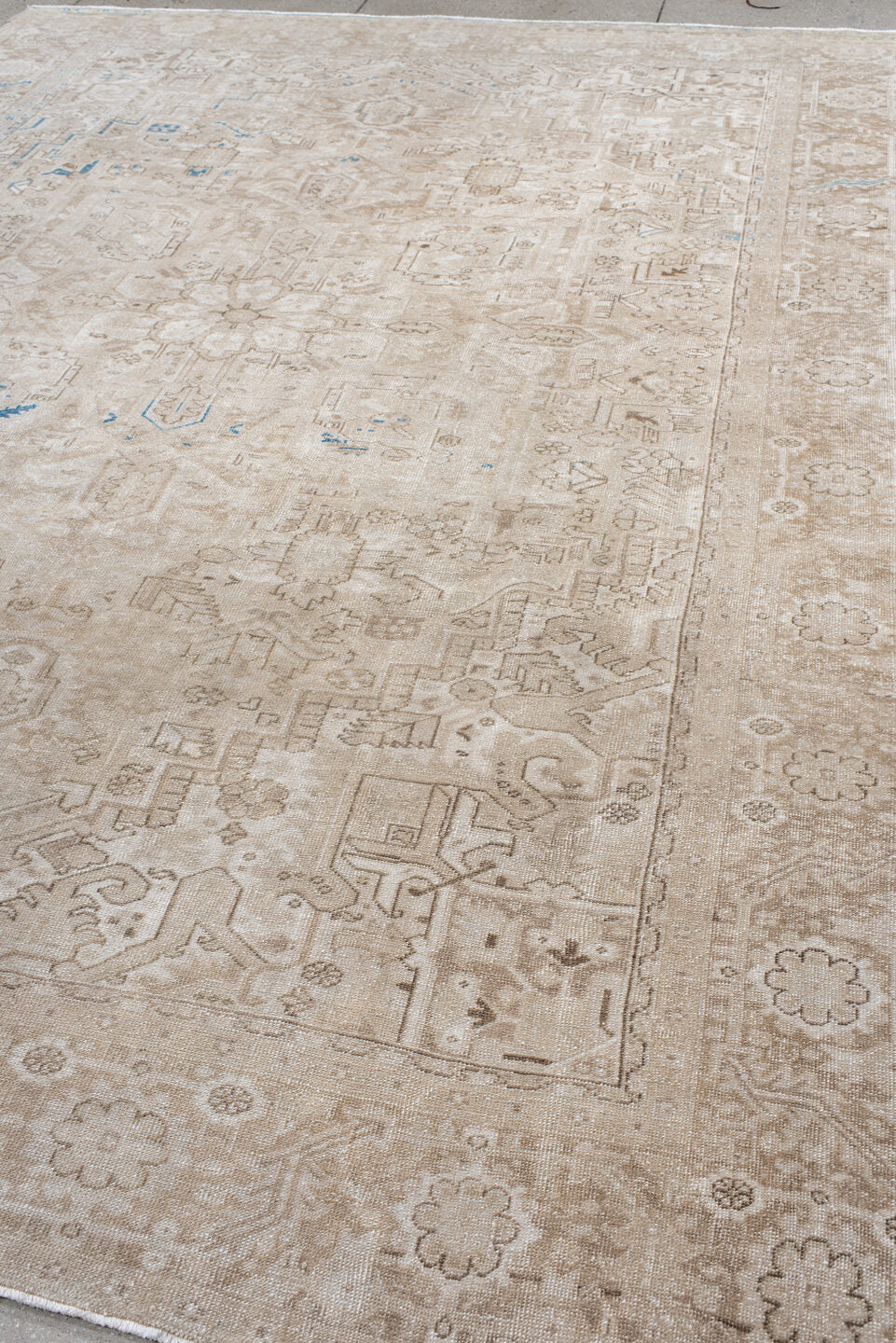 9' x 12' one-of-a-kind handmade antique Heriz large size rug. Color palette: ivory, beige, taupe, sky blue, camel, gray
