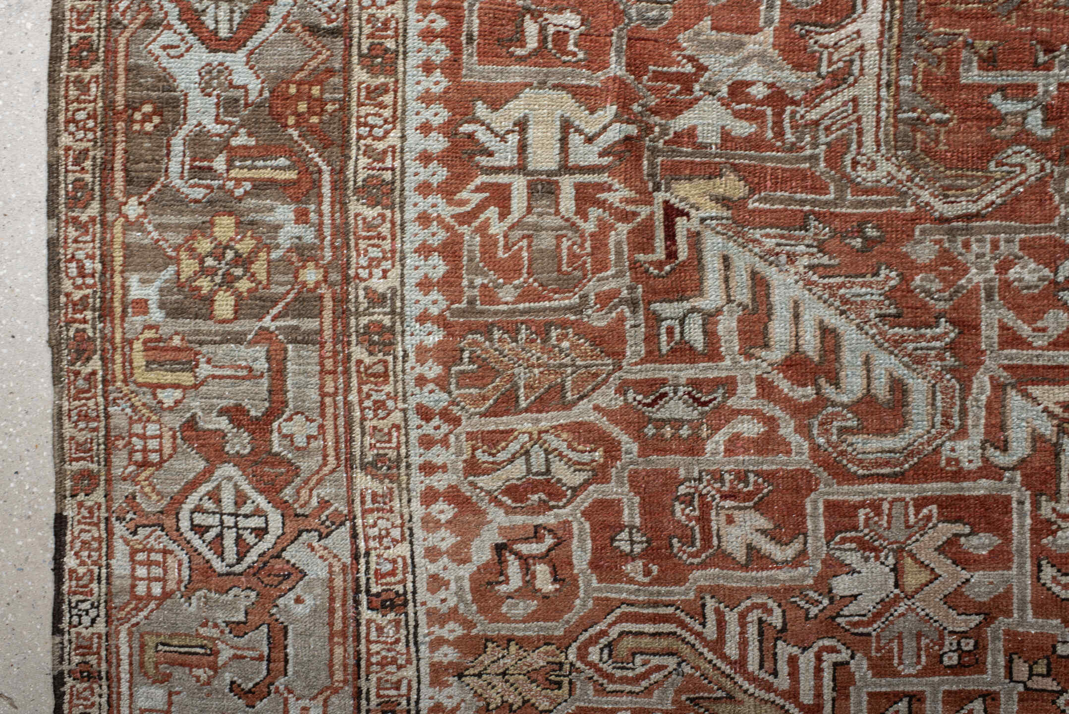 8' x 10' one-of-a-kind handmade antique large size rug. Color palette: terra cotta, ivory, pale blue, rust, taupe, brown