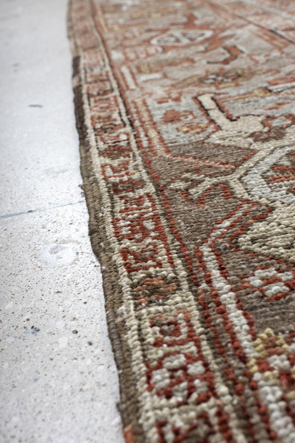 8' x 10' one-of-a-kind handmade antique large size rug. Color palette: terra cotta, ivory, pale blue, rust, taupe, brown