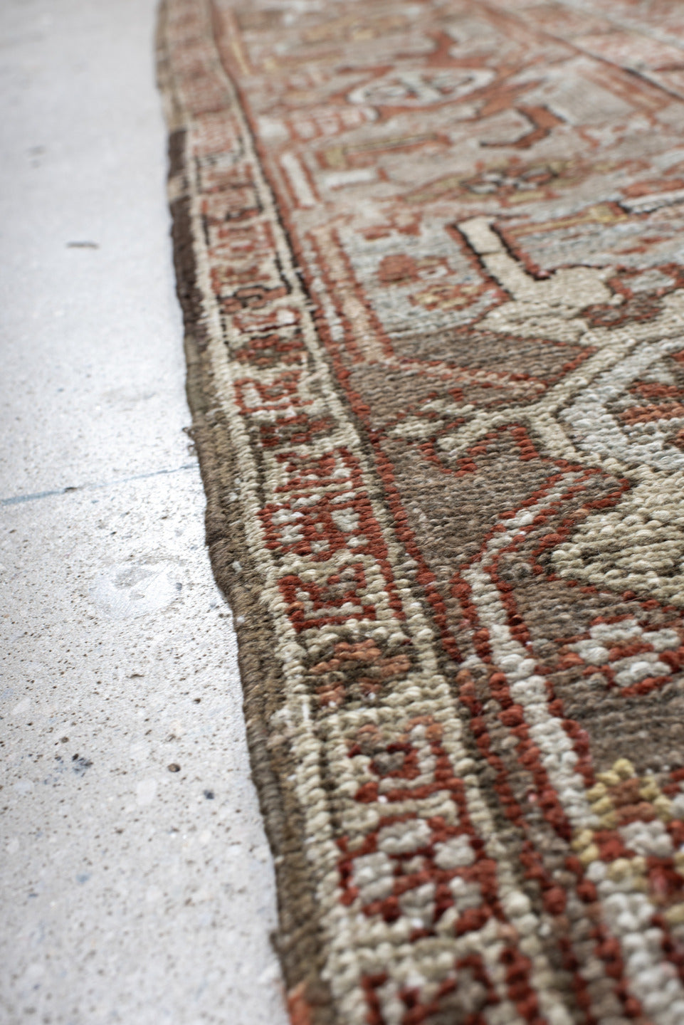 8' x 10' one-of-a-kind handmade antique large size rug. Color palette: terra cotta, ivory, pale blue, rust, taupe, brown