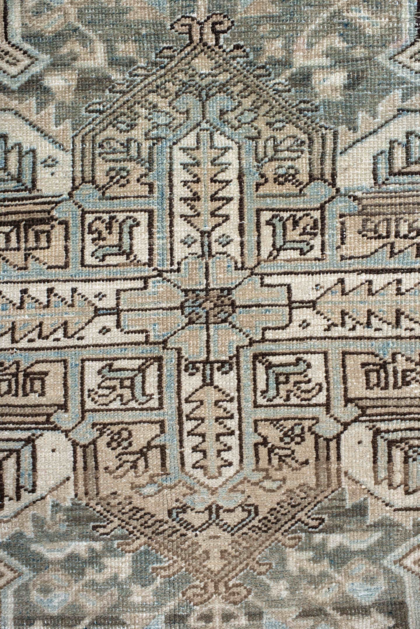 7' x 8' one-of-a-kind handmade antique Heriz rug. Color palette: ivory, pale blue, taupe, brown, beige, camel, slate
