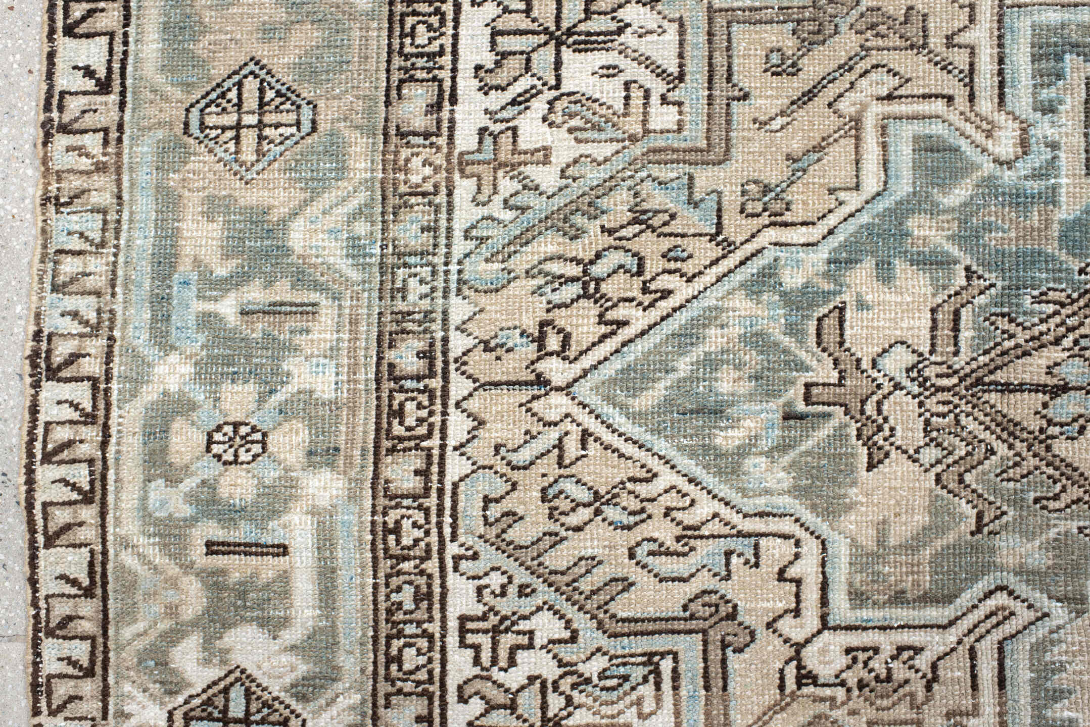 7' x 8' one-of-a-kind handmade vintage Heriz rug. Color palette: black, brown, gray, light gray, linen, off-white, pink