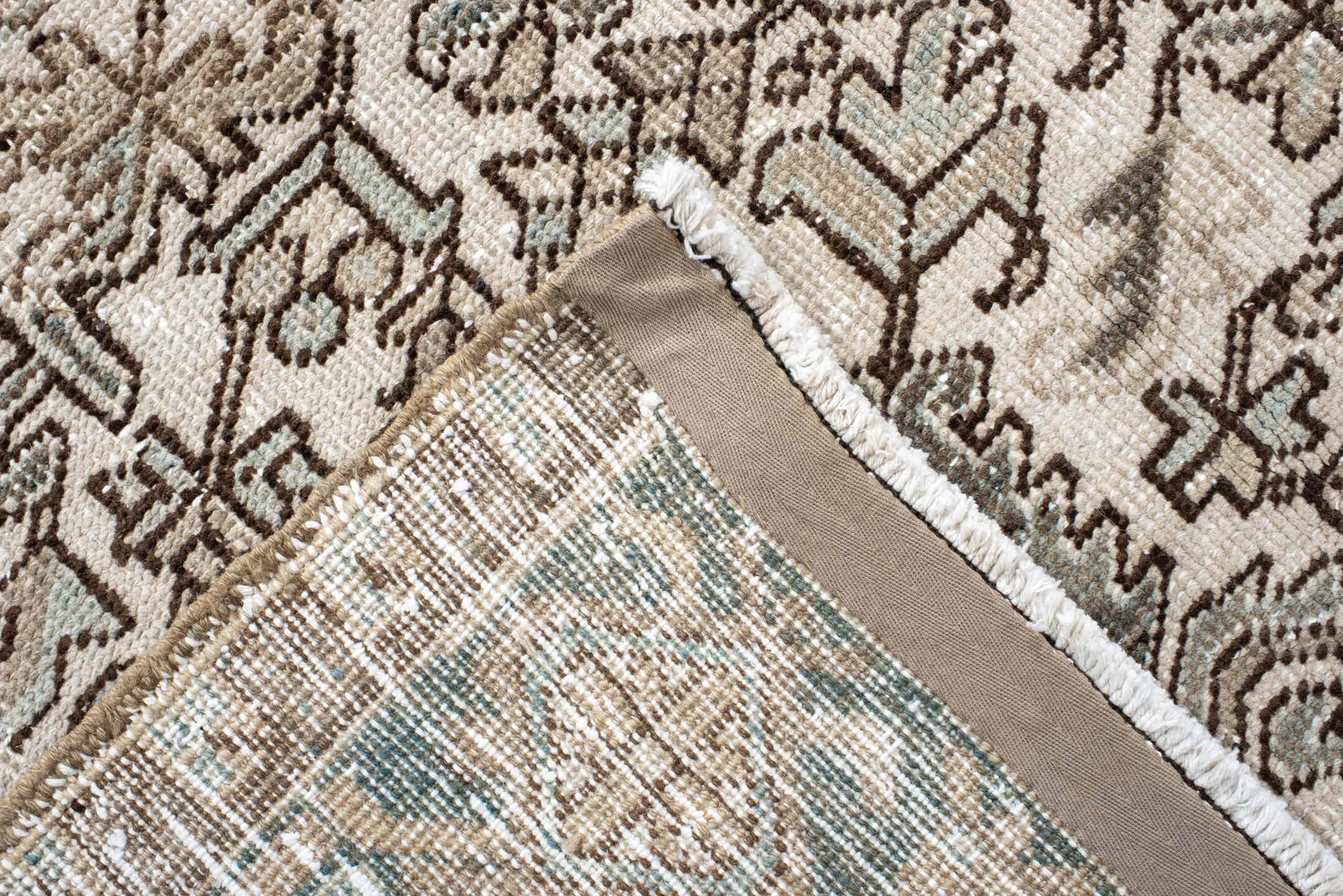 7' x 8' one-of-a-kind handmade antique Heriz rug. Color palette: ivory, pale blue, taupe, brown, beige, camel, slate