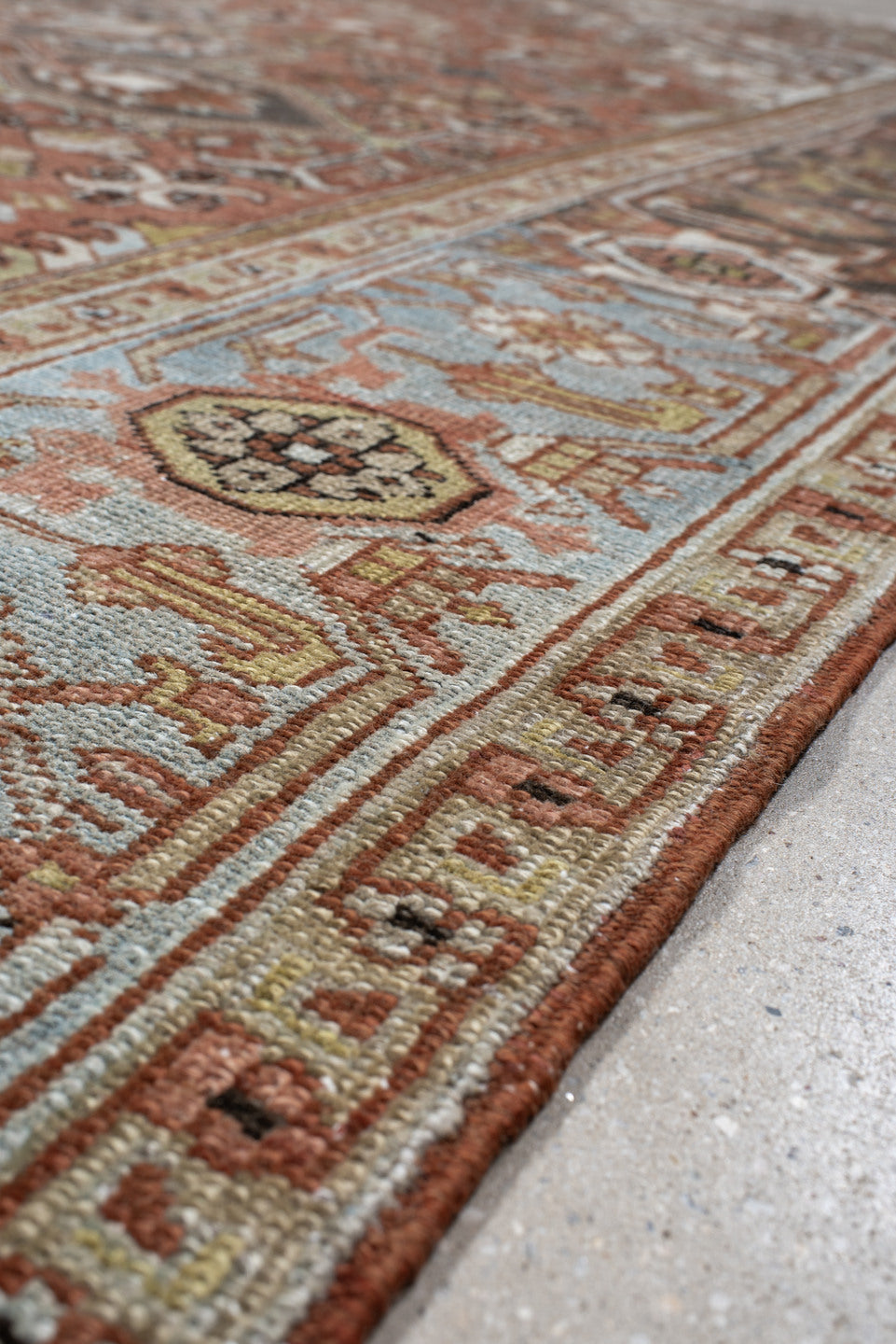 8' x 11' one-of-a-kind handmade vintage Heriz large size rug. Color palette: terra cotta, ivory, sky blue, charcoal, taupe