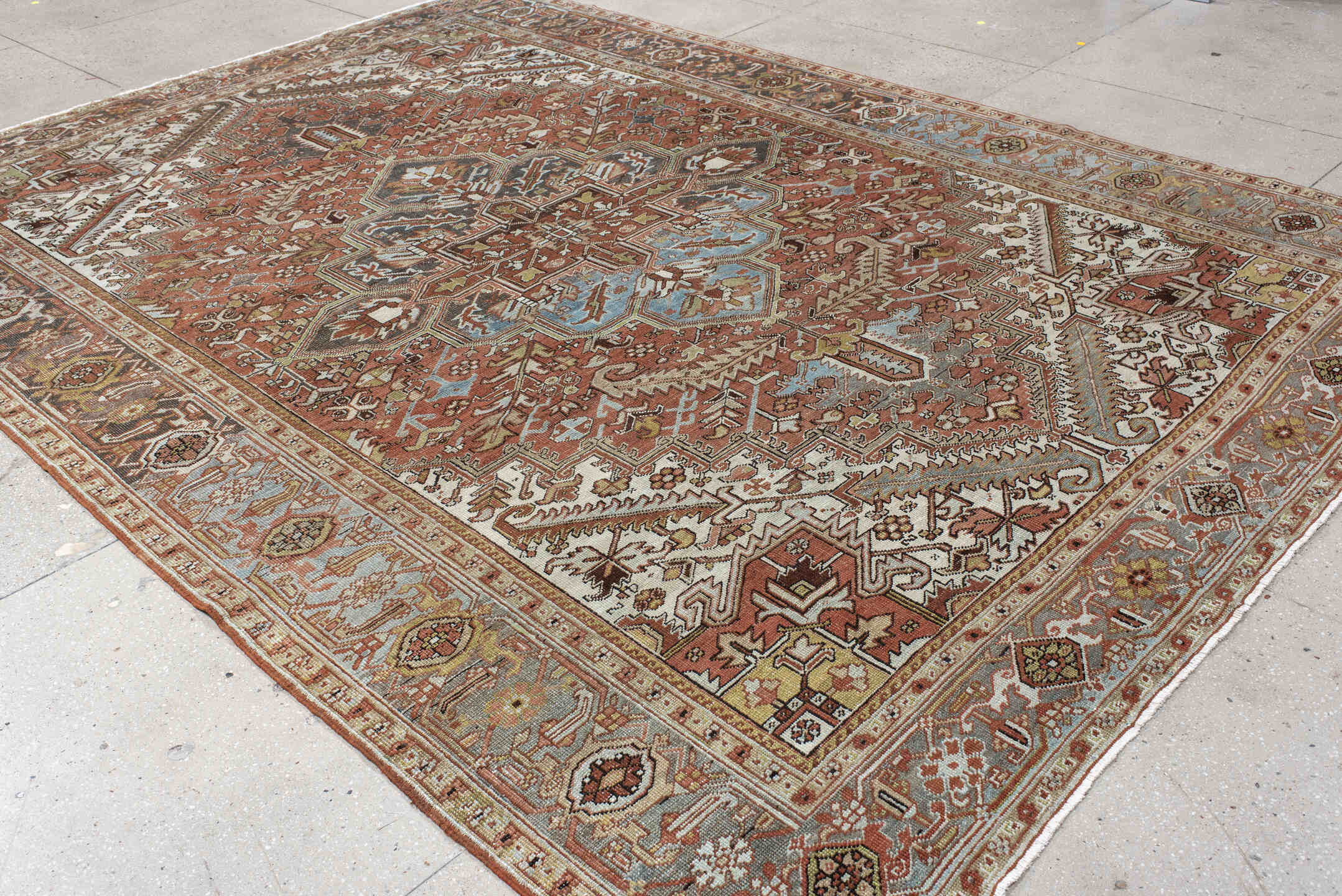 8' x 11' one-of-a-kind handmade vintage Heriz large size rug. Color palette: terra cotta, ivory, sky blue, charcoal, taupe