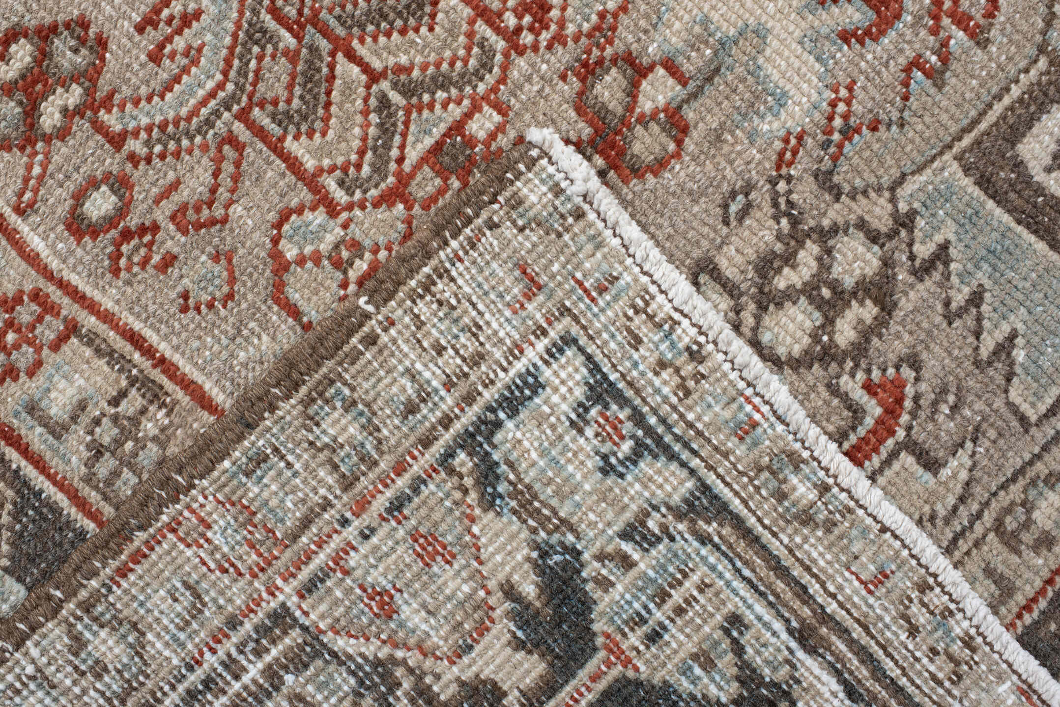 7' x 8' one-of-a-kind handmade vintage Heriz rug. Color palette: black, brown, gray, light gray, off-white, pink, red