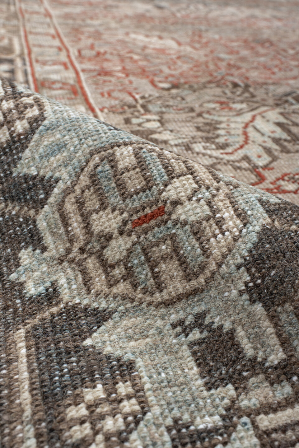 7' x 8' one-of-a-kind handmade vintage Heriz rug. Color palette: black, brown, gray, light gray, off-white, pink, red