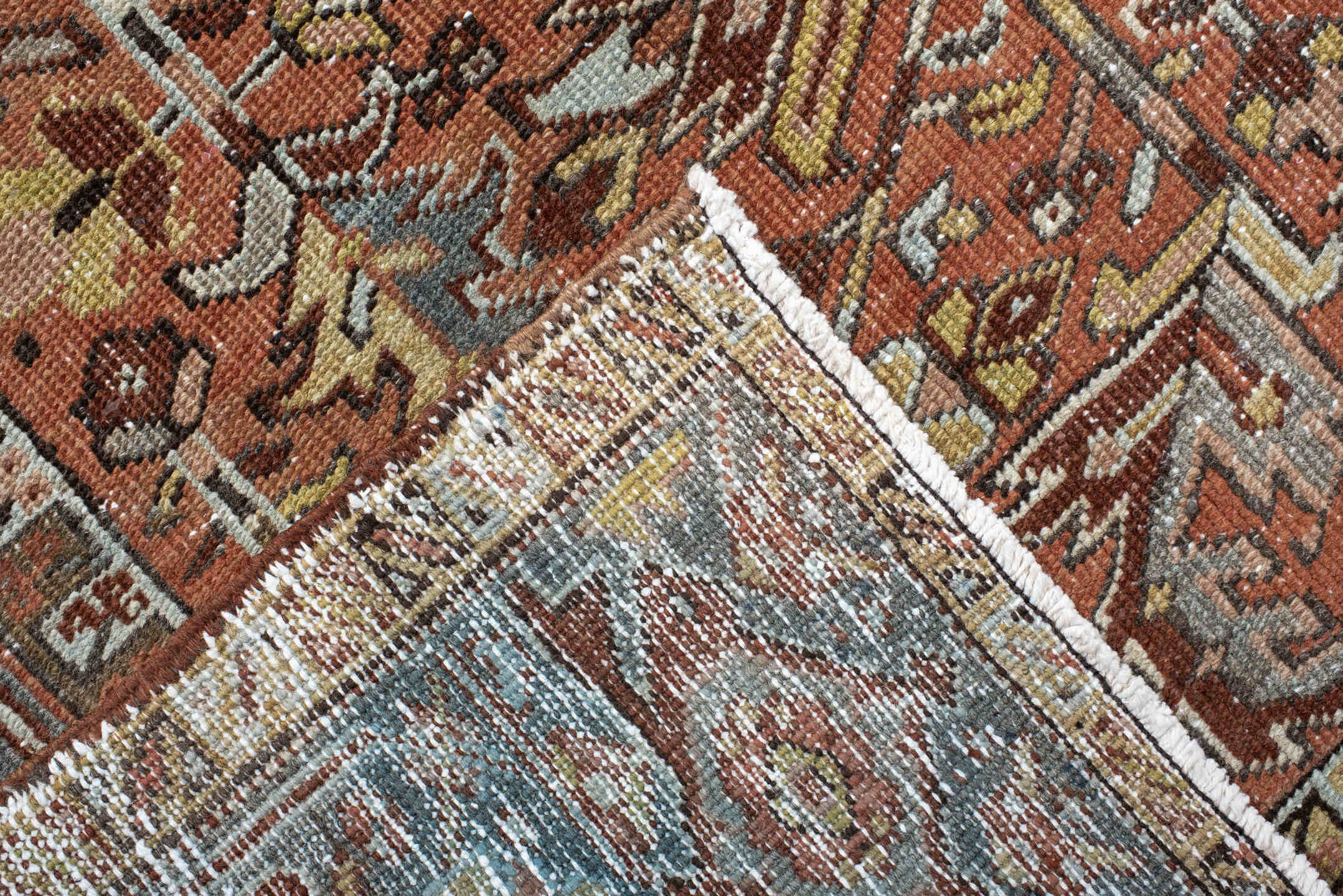 6' x 7' one-of-a-kind handmade vintage Heriz rug. Color palette: terra cotta, slate blue, ivory, charcoal, rust, camel