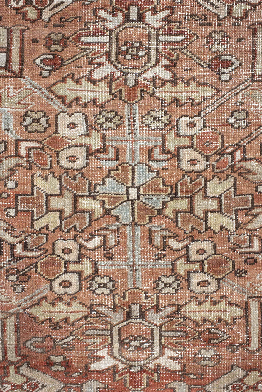 6' x 9' one-of-a-kind handmade antique Heriz medium size rug. Color palette: terra cotta, ivory, taupe, charcoal, slate