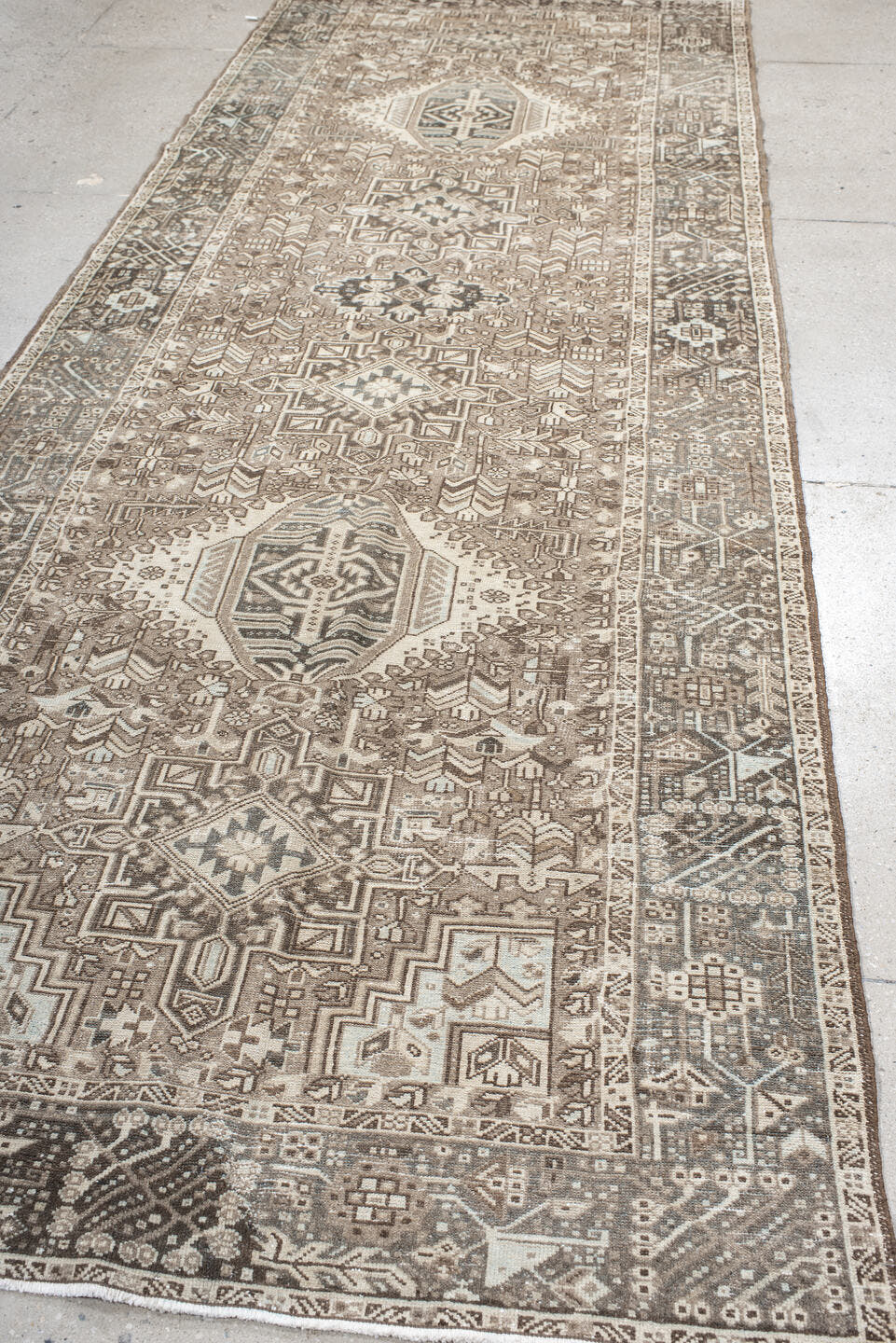4' x 12' one-of-a-kind handmade antique Karaje runner rug. Color palette: taupe, ivory, brown, slate, charcoal, camel, beige