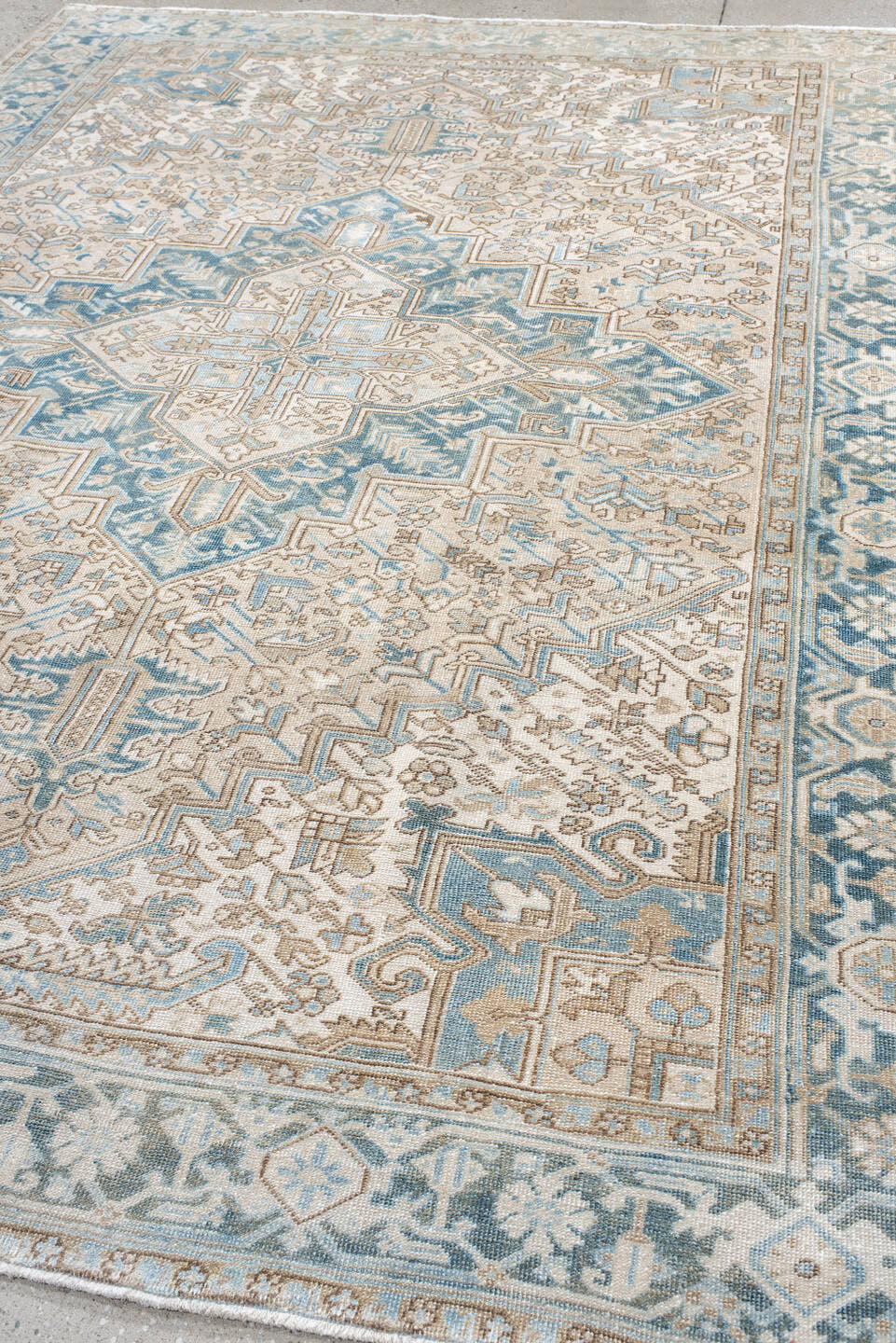 8' x 10' one-of-a-kind handmade antique Heriz large size rug. Color palette: ivory, sky blue, camel, taupe, light blue