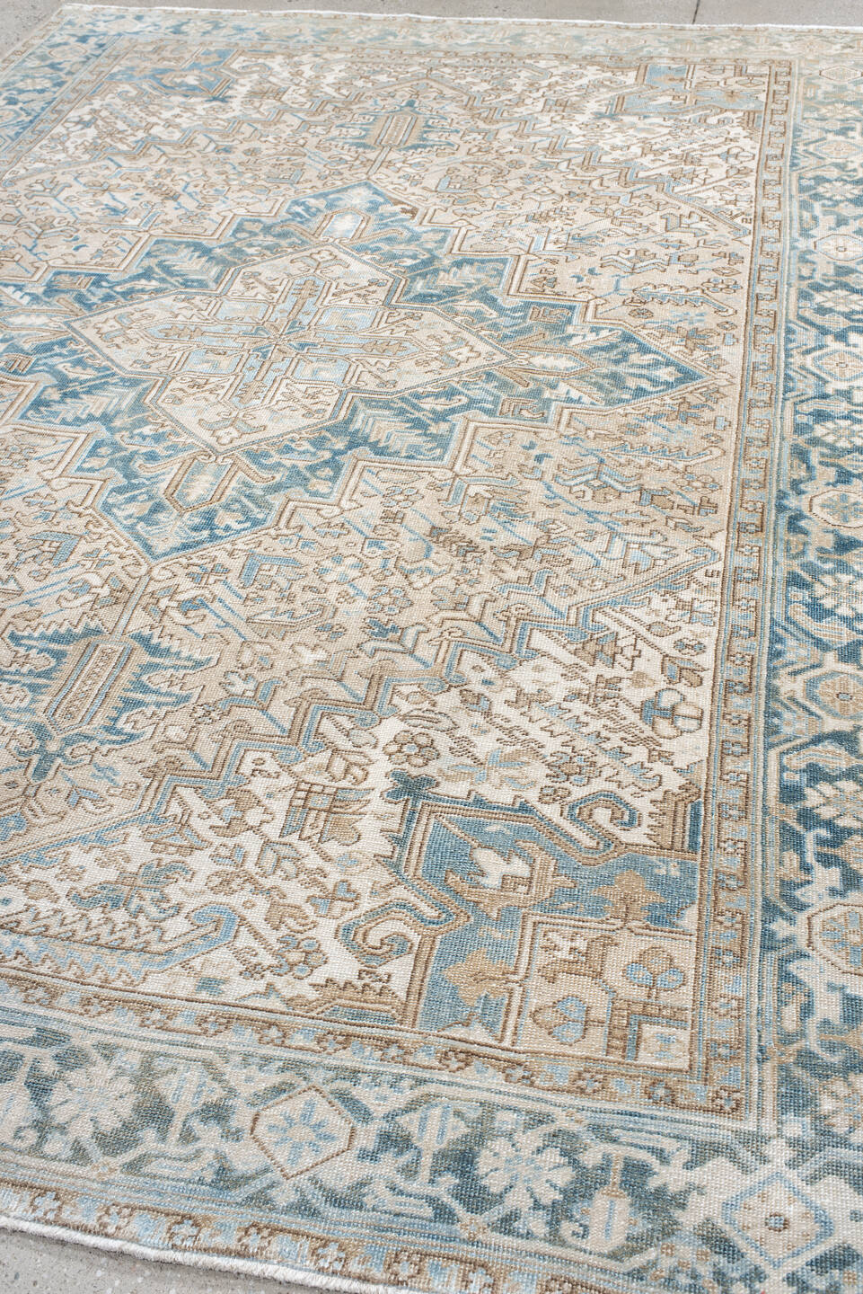 8' x 10' one-of-a-kind handmade antique Heriz large size rug. Color palette: ivory, sky blue, camel, taupe, light blue