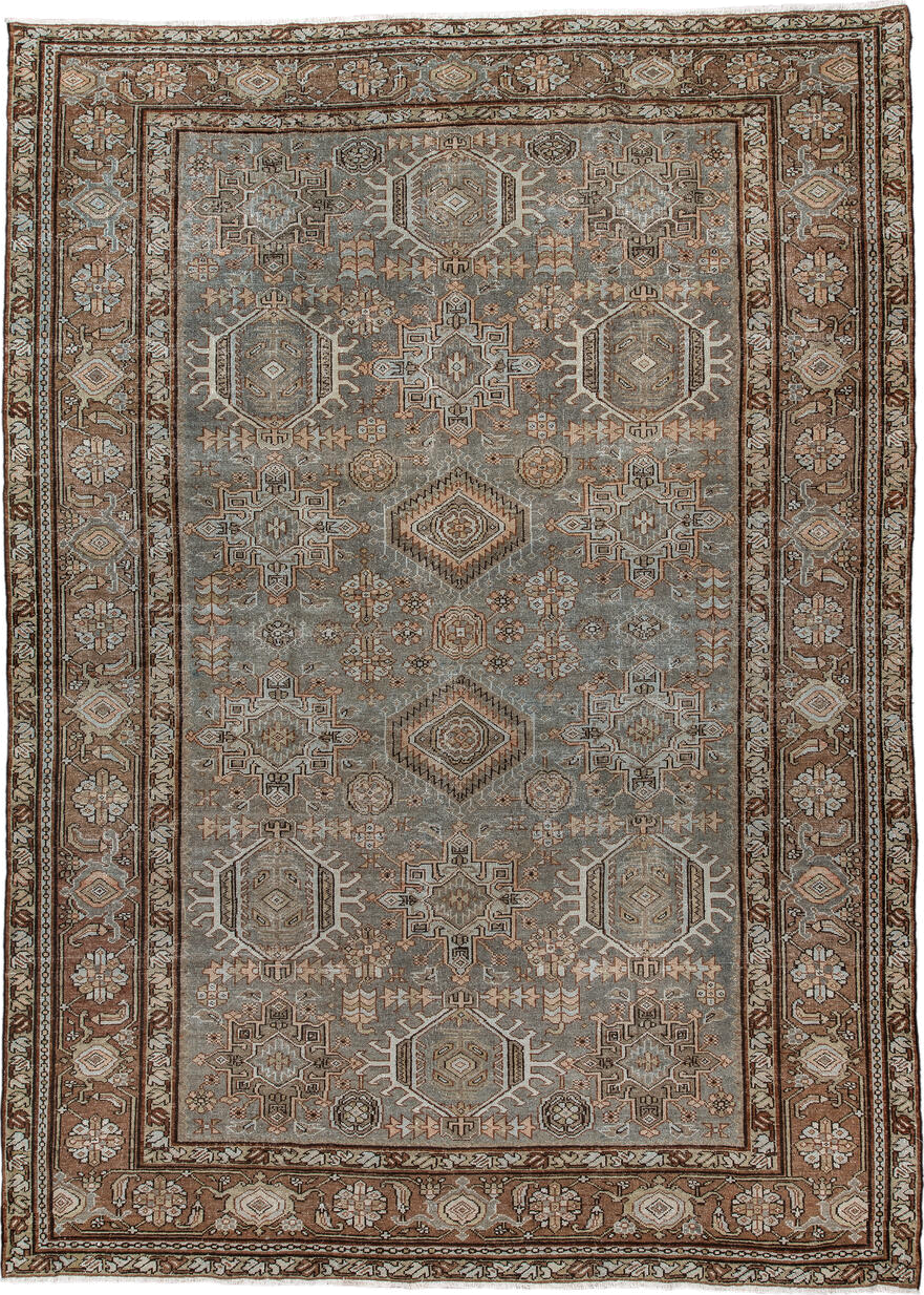 7' x 10' one-of-a-kind handmade vintage Karaje large size rug. Color palette: taupe, brown, ivory, camel, slate, rust, beige