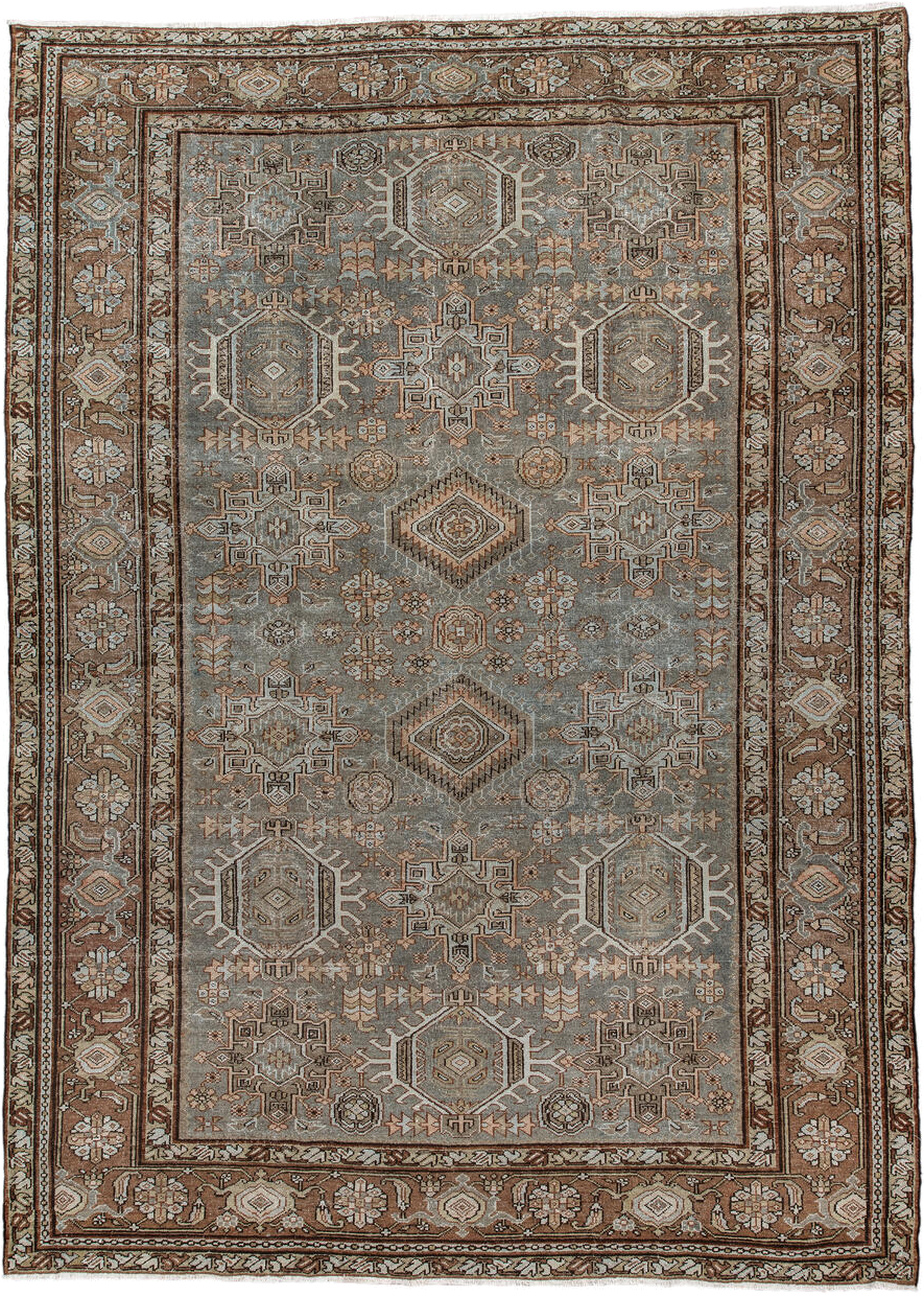 7' x 10' one-of-a-kind handmade vintage Karaje large size rug. Color palette: taupe, brown, ivory, camel, slate, rust, beige