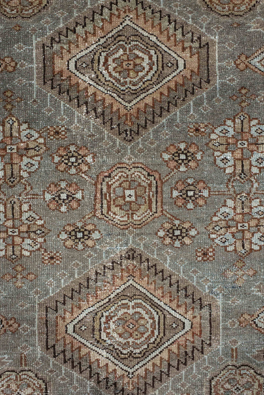 7' x 10' one-of-a-kind handmade vintage Karaje large size rug. Color palette: taupe, brown, ivory, camel, slate, rust, beige