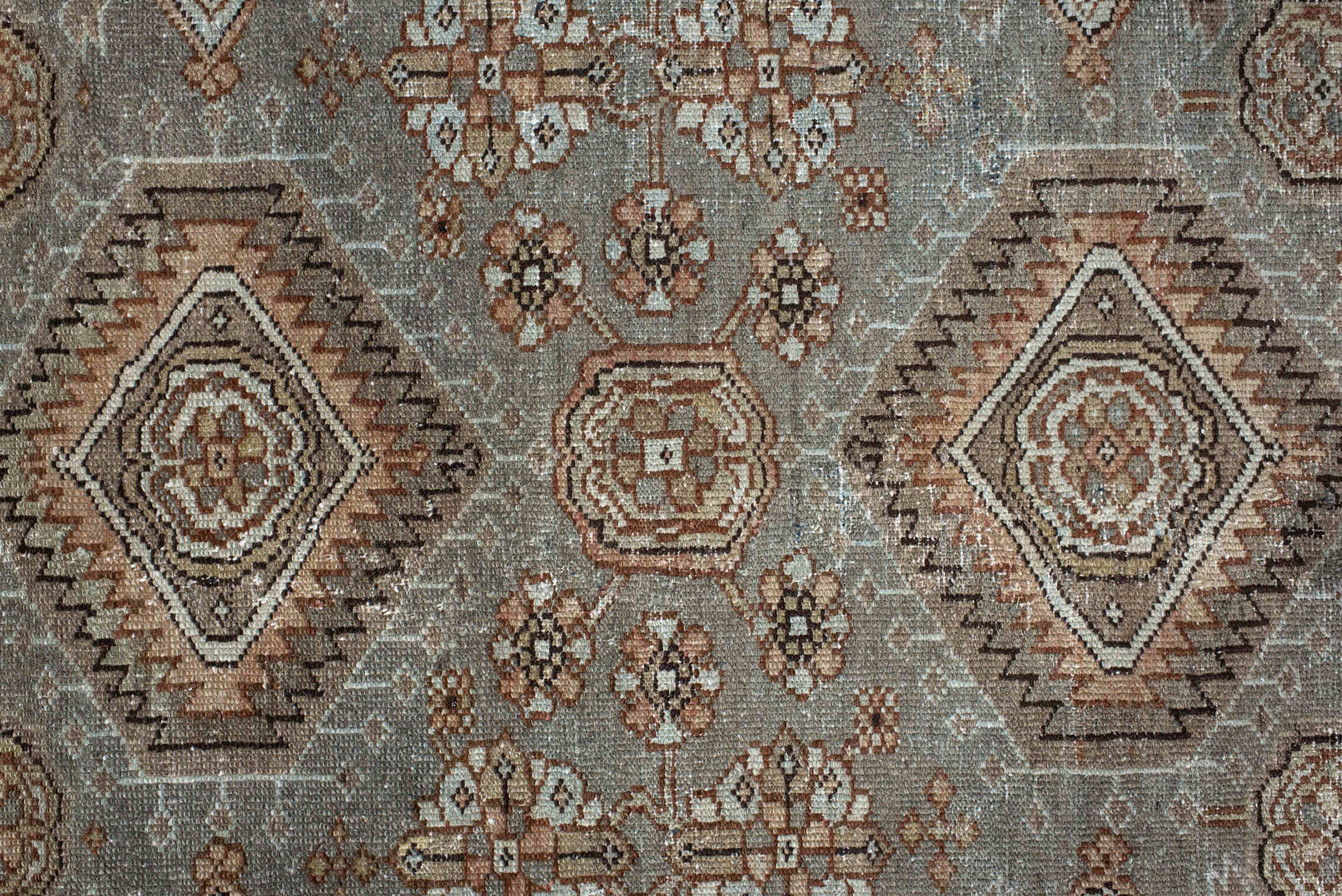 7' x 10' one-of-a-kind handmade vintage Karaje large size rug. Color palette: taupe, brown, ivory, camel, slate, rust, beige