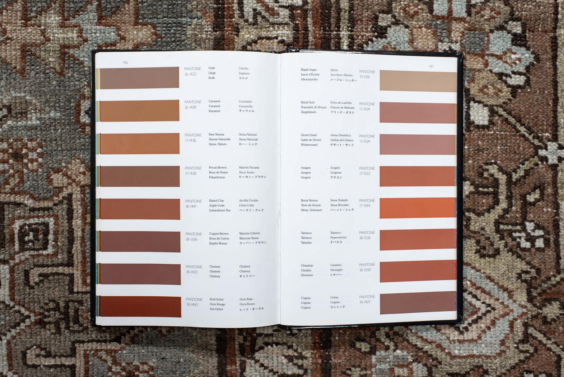 7' x 10' one-of-a-kind handmade vintage Karaje large size rug. Color palette: taupe, brown, ivory, camel, slate, rust, beige