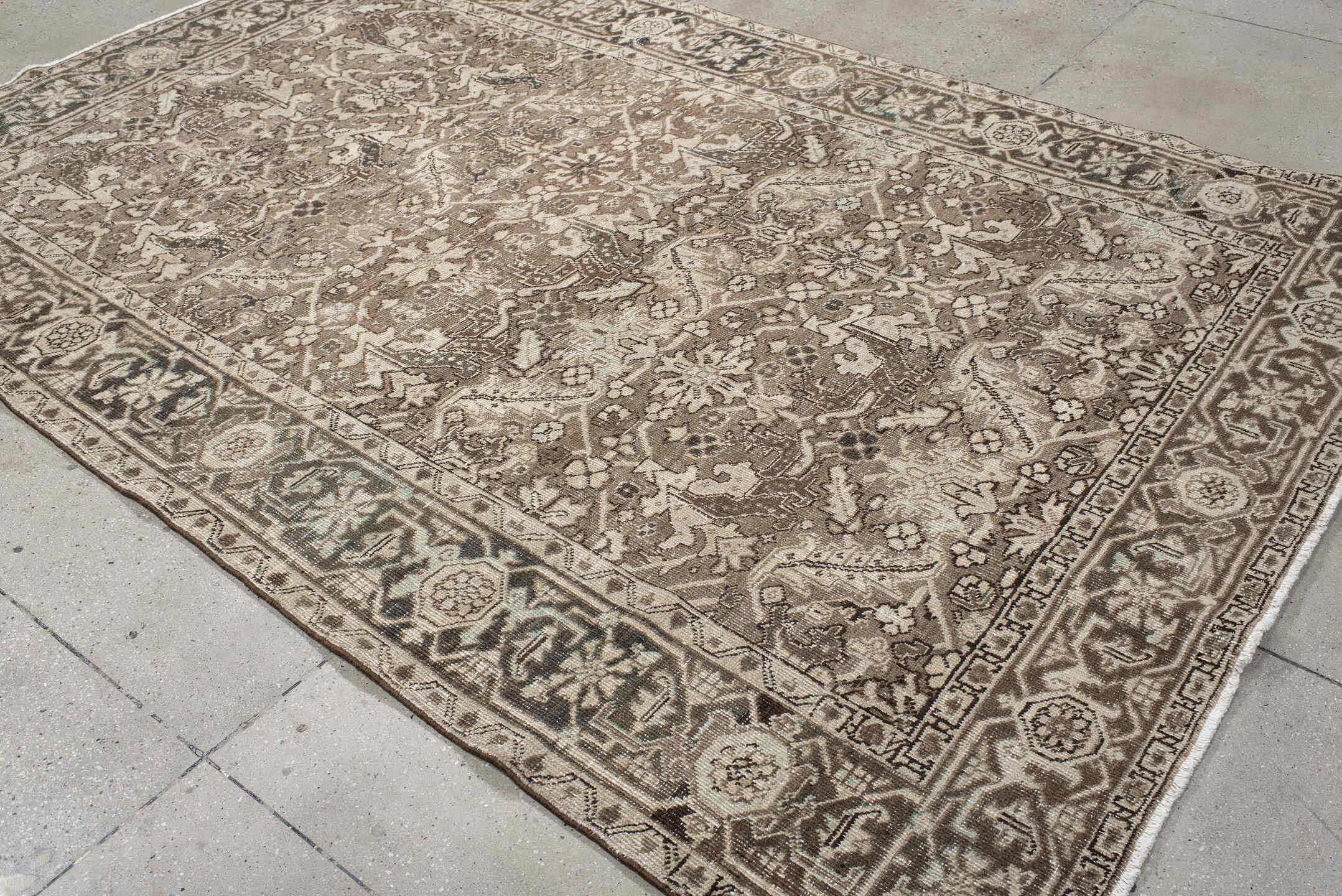 6' x 10' one-of-a-kind handmade vintage large size rug. Color palette: taupe, ivory, charcoal, brown, beige, gray, black