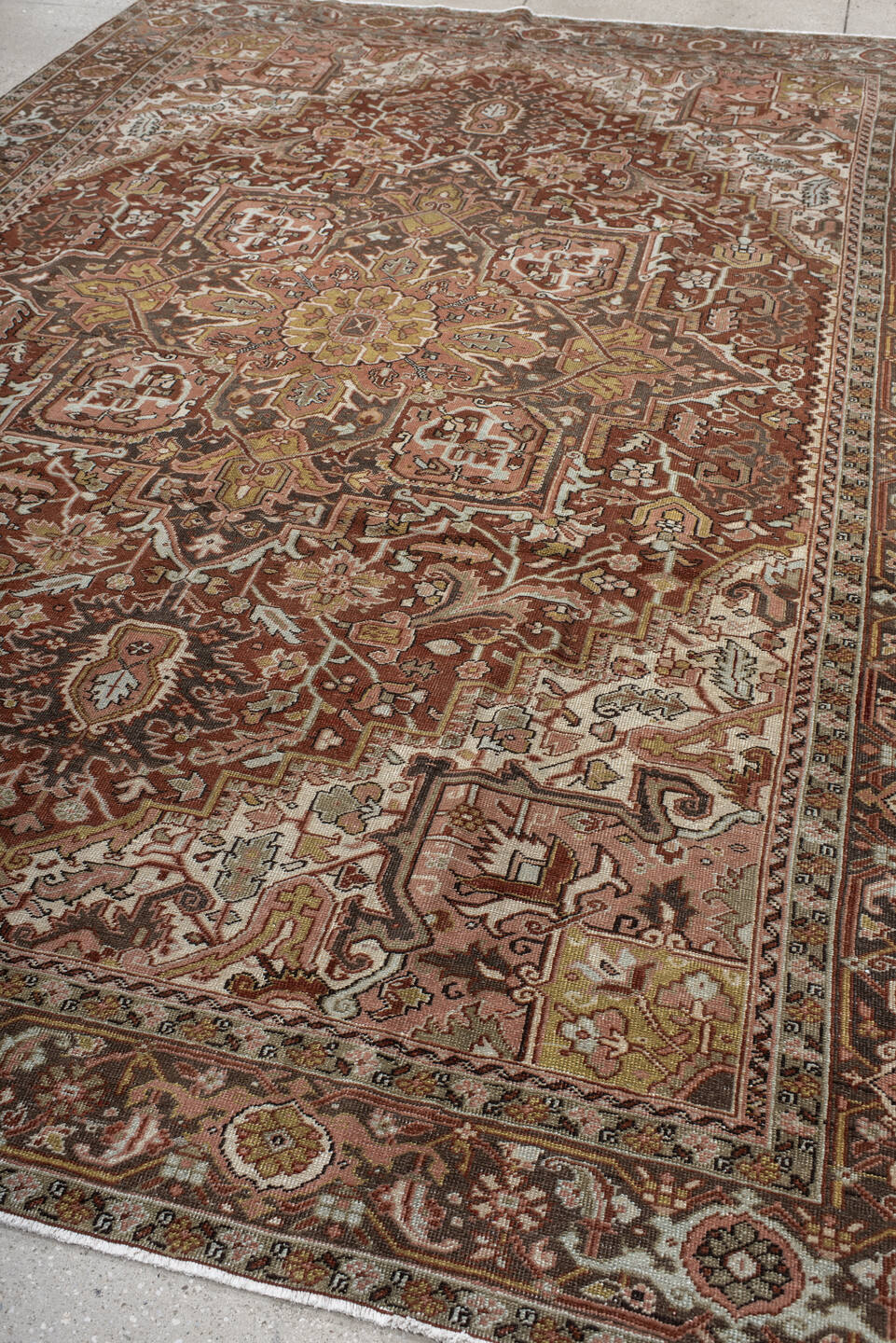 8' x 11' one-of-a-kind handmade vintage Heriz large size rug. Color palette: rust, ivory, brown, olive, rose, charcoal
