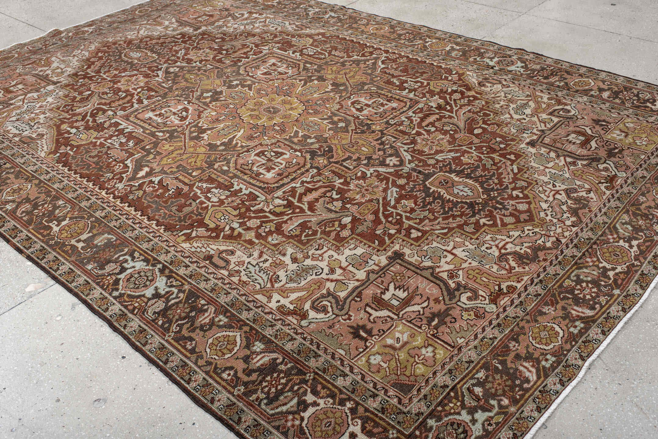 8' x 11' one-of-a-kind handmade vintage Heriz large size rug. Color palette: rust, ivory, brown, olive, rose, charcoal